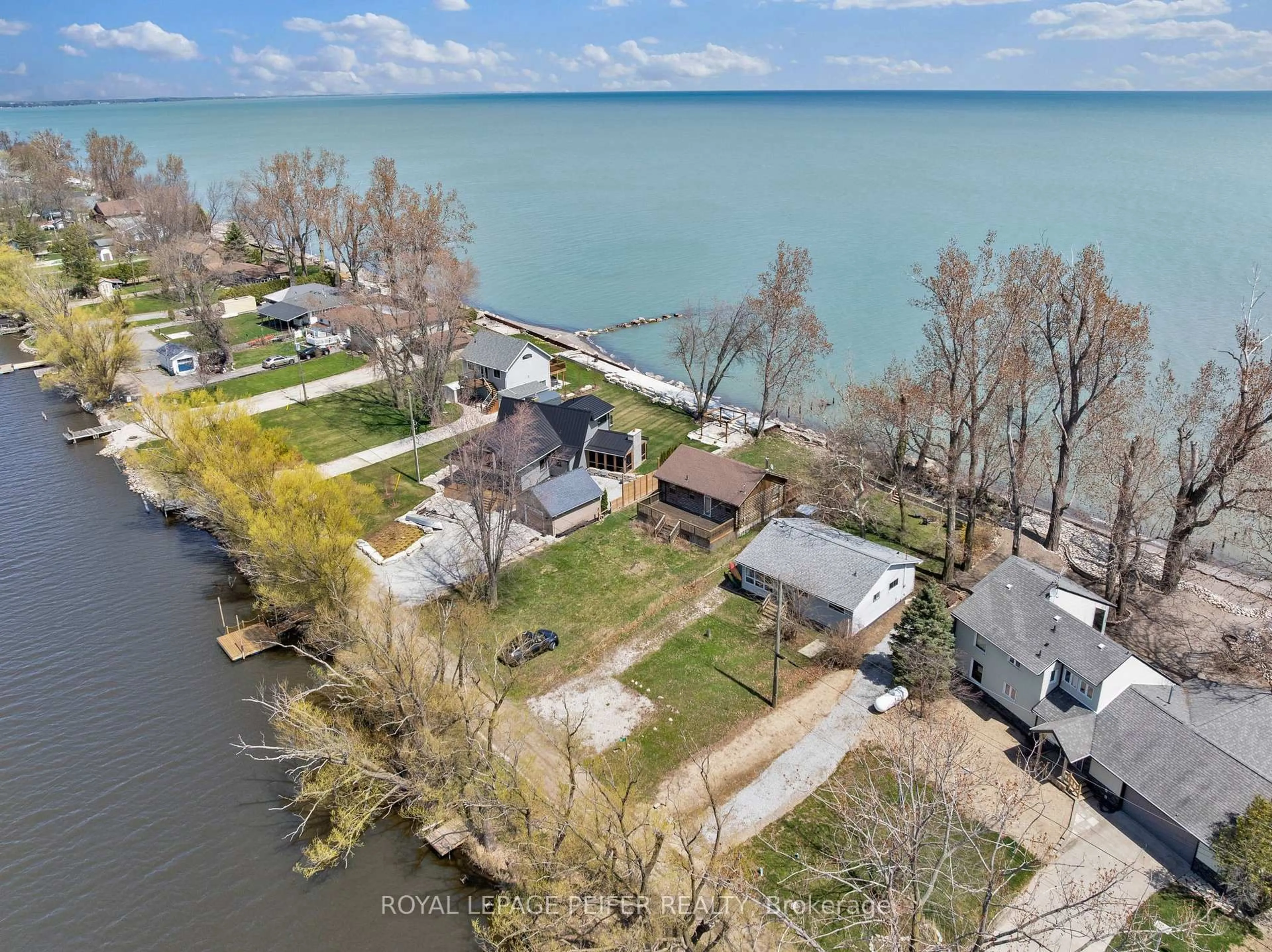 A pic from outside/outdoor area/front of a property/back of a property/a pic from drone, water/lake/river/ocean view for 83 Marentette Beach Rd, Leamington Ontario N8H 3V7