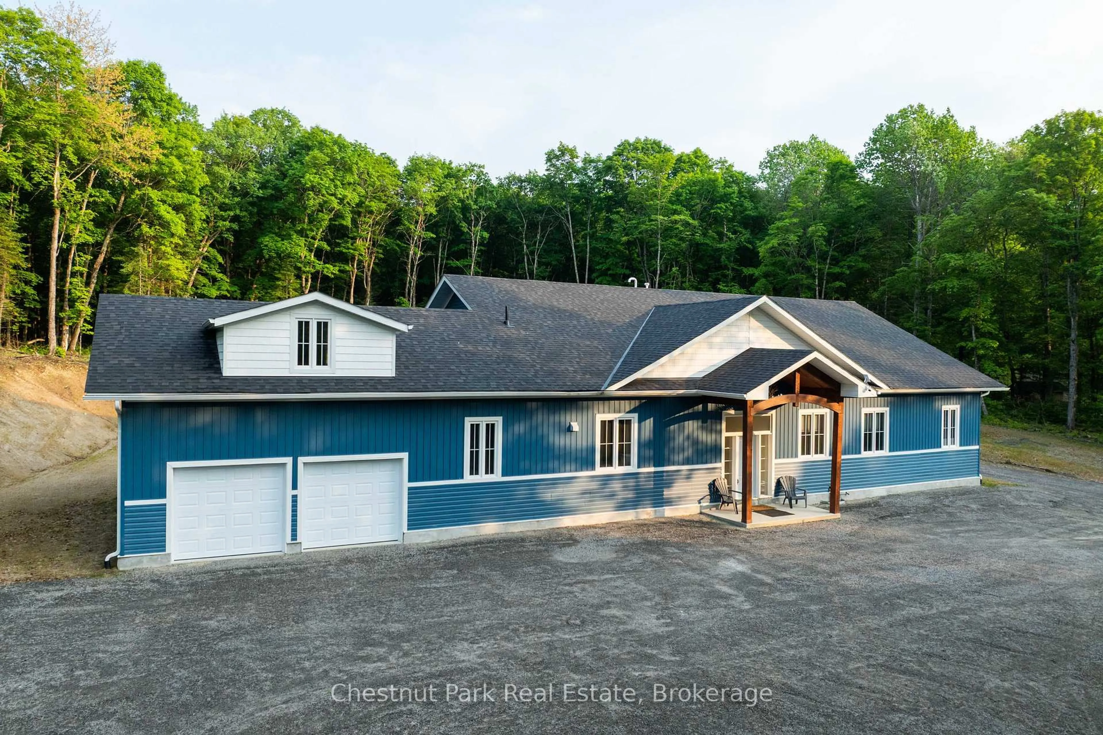 A pic from outside/outdoor area/front of a property/back of a property/a pic from drone, water/lake/river/ocean view for 1153 Deer Lake Rd, Perry Ontario P0A 1Z0