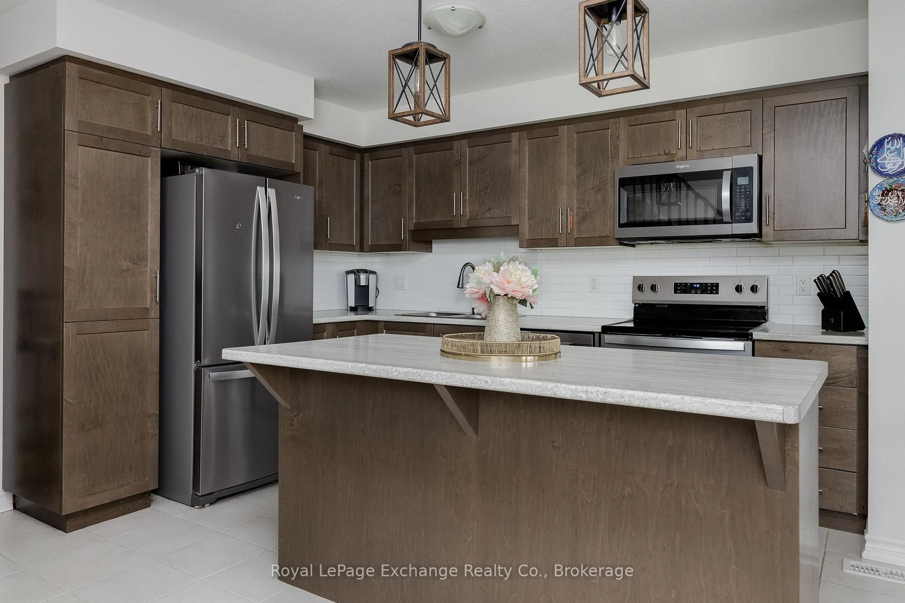 Open concept kitchen, ceramic/tile floor for 409 Joseph St #39, Saugeen Shores Ontario N0H 2C2