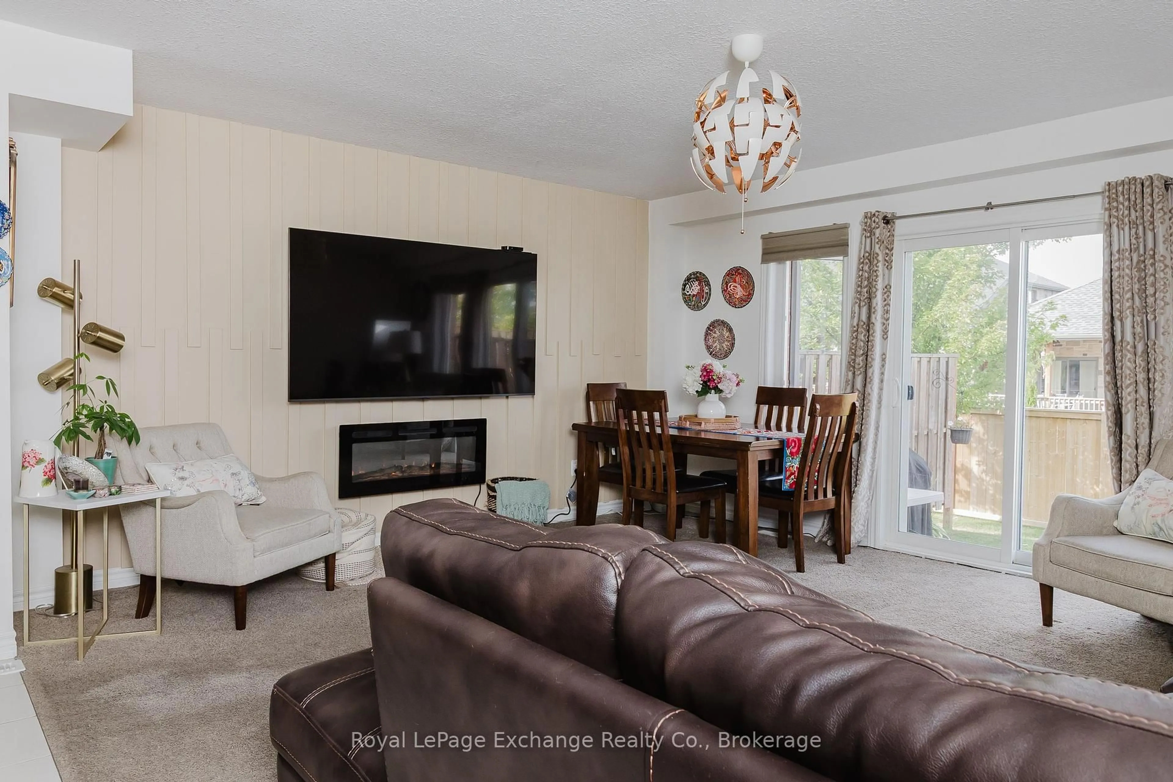 Living room with furniture, wood/laminate floor for 409 Joseph St #39, Saugeen Shores Ontario N0H 2C2