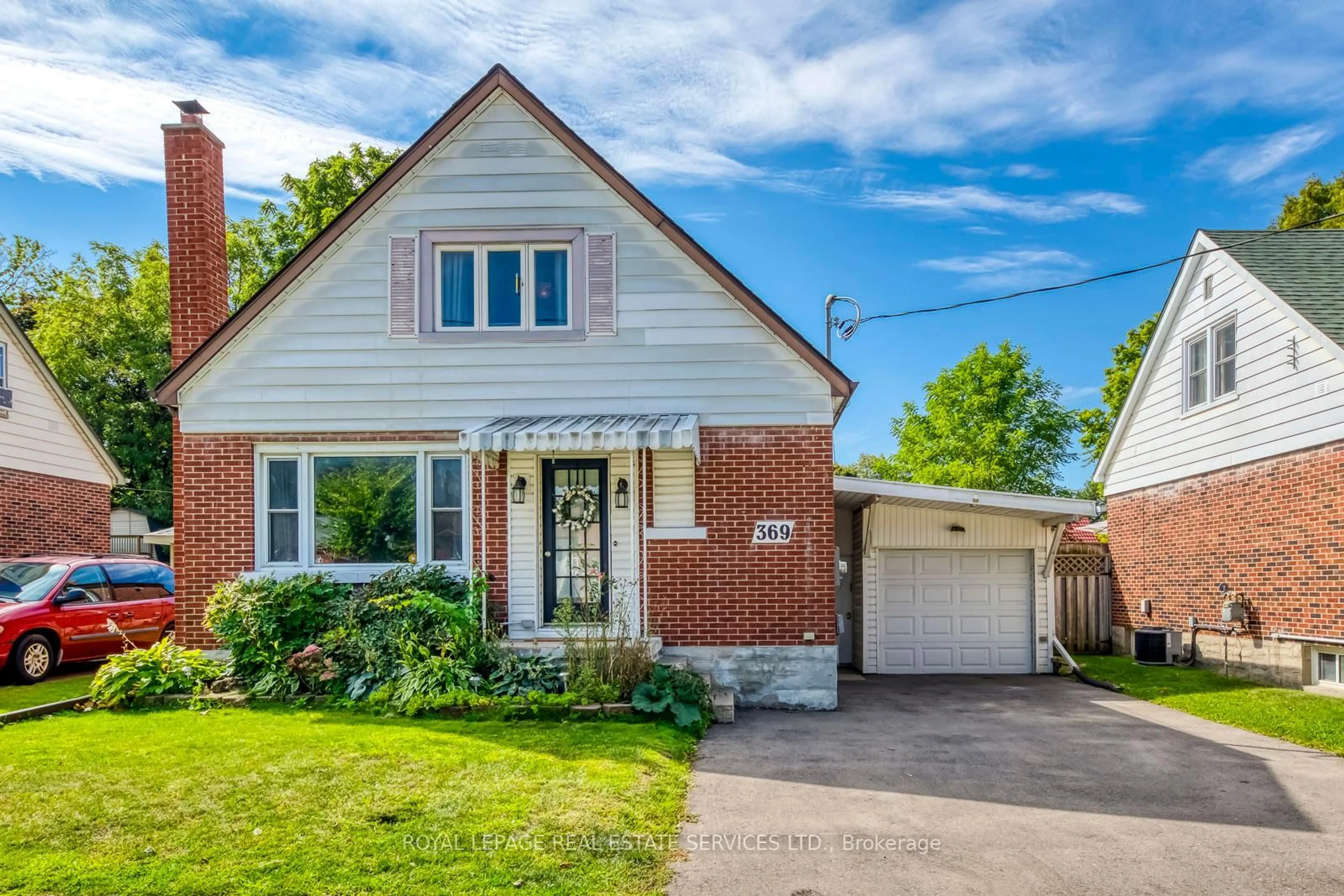 Home with brick exterior material, street for 369 Mill St, Kitchener Ontario N2M 3R9