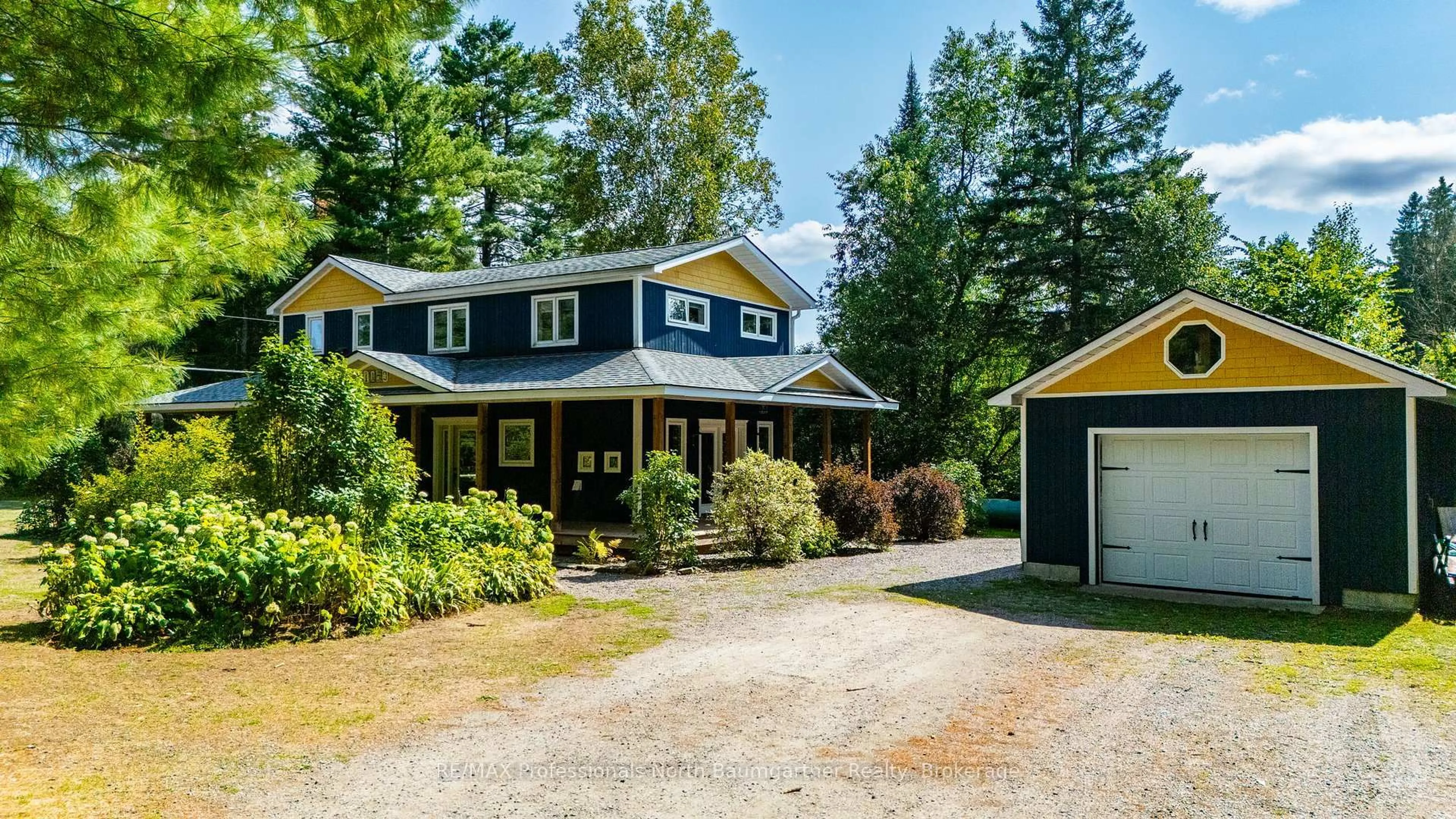A pic from outside/outdoor area/front of a property/back of a property/a pic from drone, street for 1850 Scotch Line Rd, Minden Hills Ontario K0M 2K0