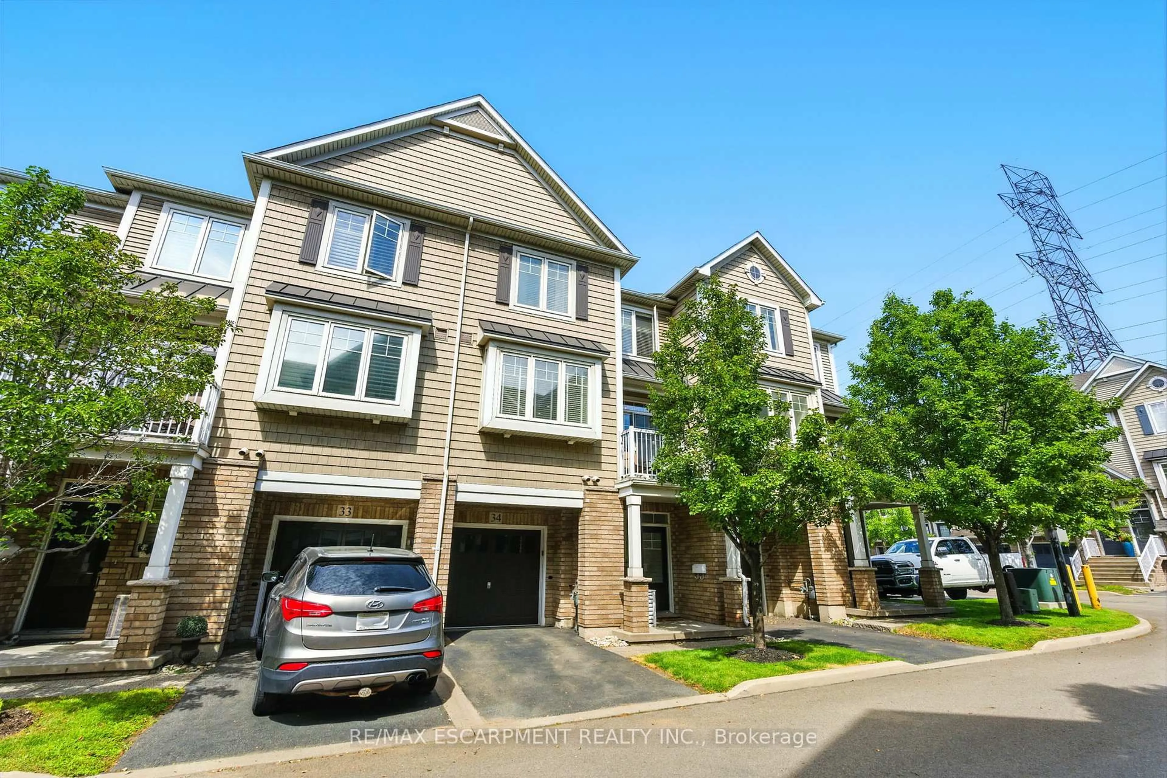 A pic from outside/outdoor area/front of a property/back of a property/a pic from drone, street for 337 Beach Blvd #34, Hamilton Ontario L8H 6W4