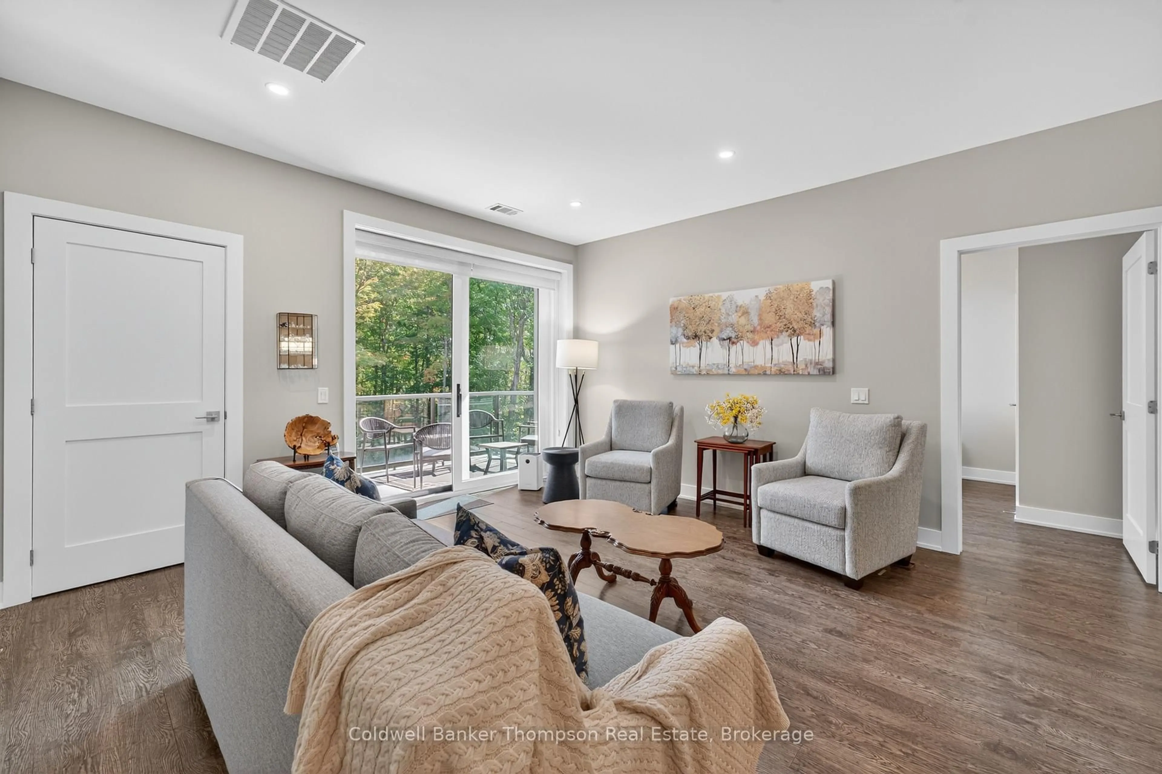 Living room with furniture, unknown for 23 Campus Tr ##102, Huntsville Ontario P1H 0G1