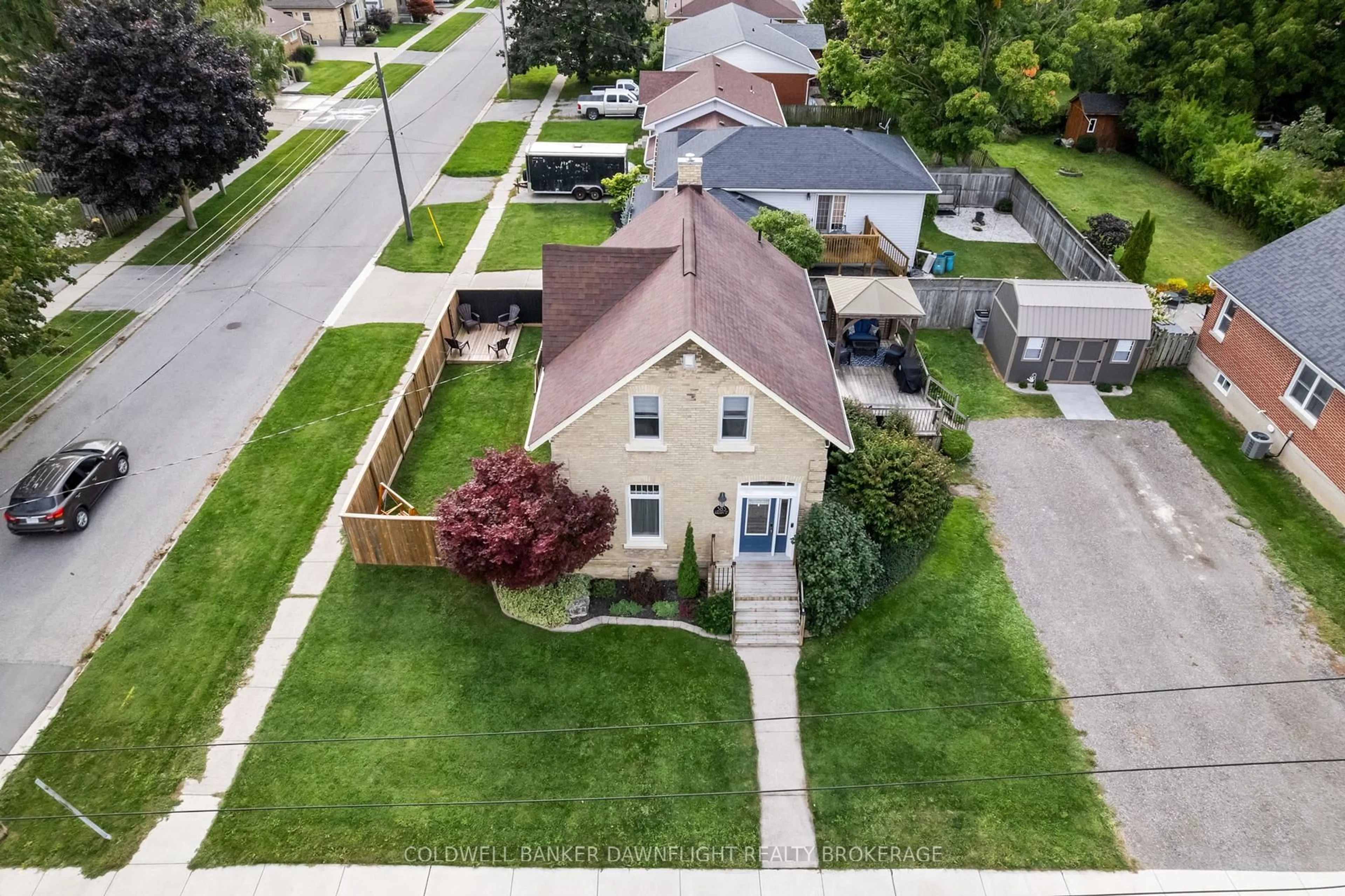 A pic from outside/outdoor area/front of a property/back of a property/a pic from drone, street for 383 William St, South Huron Ontario N0M 1S2