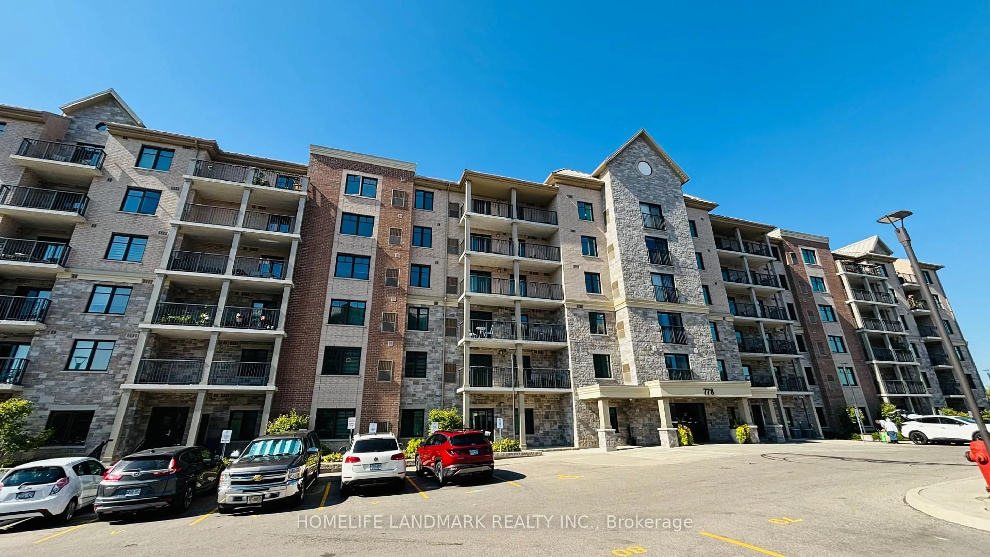 A pic from outside/outdoor area/front of a property/back of a property/a pic from drone, building for 778 Laurelwood Dr #410, Waterloo Ontario N2V 0G3