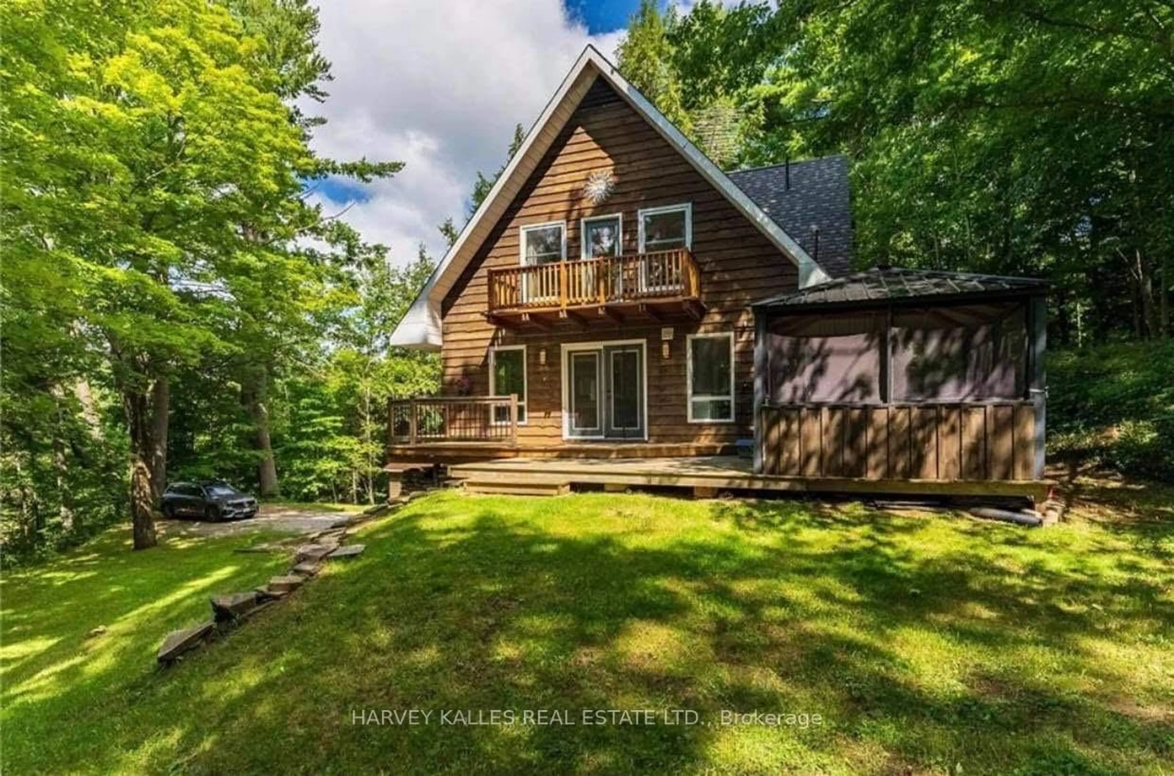 A pic from outside/outdoor area/front of a property/back of a property/a pic from drone, water/lake/river/ocean view for 1047 RANSLEY Rd, Minden Hills Ontario K0M 2K0
