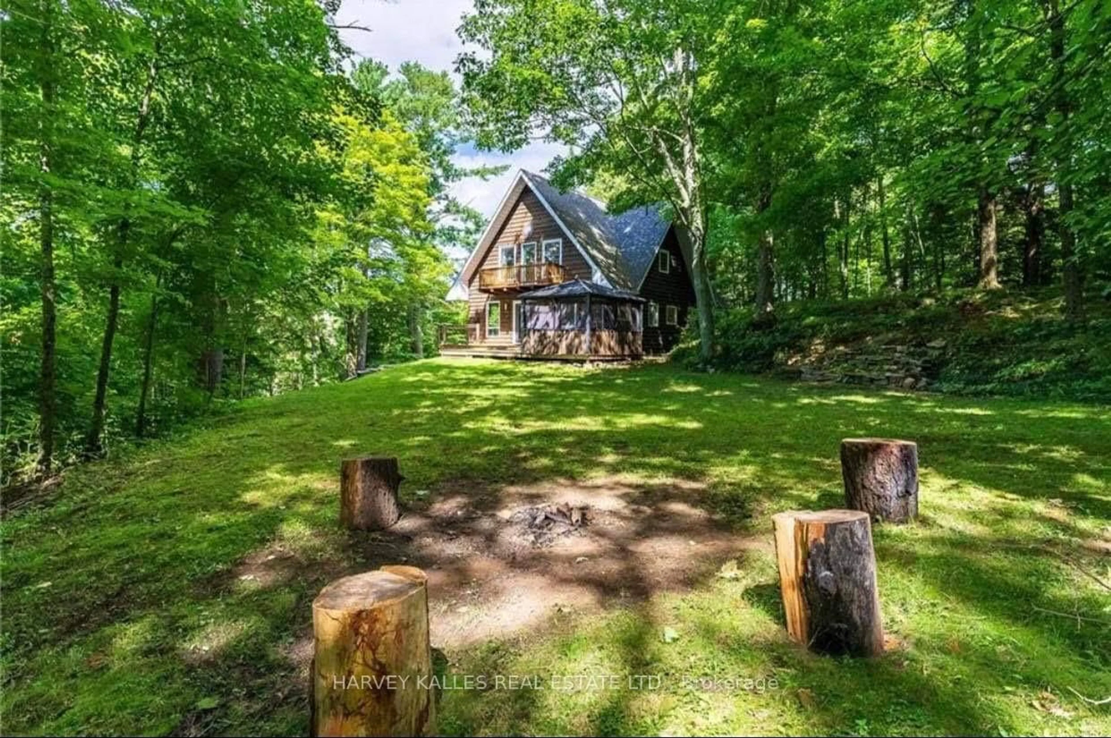 A pic from outside/outdoor area/front of a property/back of a property/a pic from drone, forest/trees view for 1047 RANSLEY Rd, Minden Hills Ontario K0M 2K0