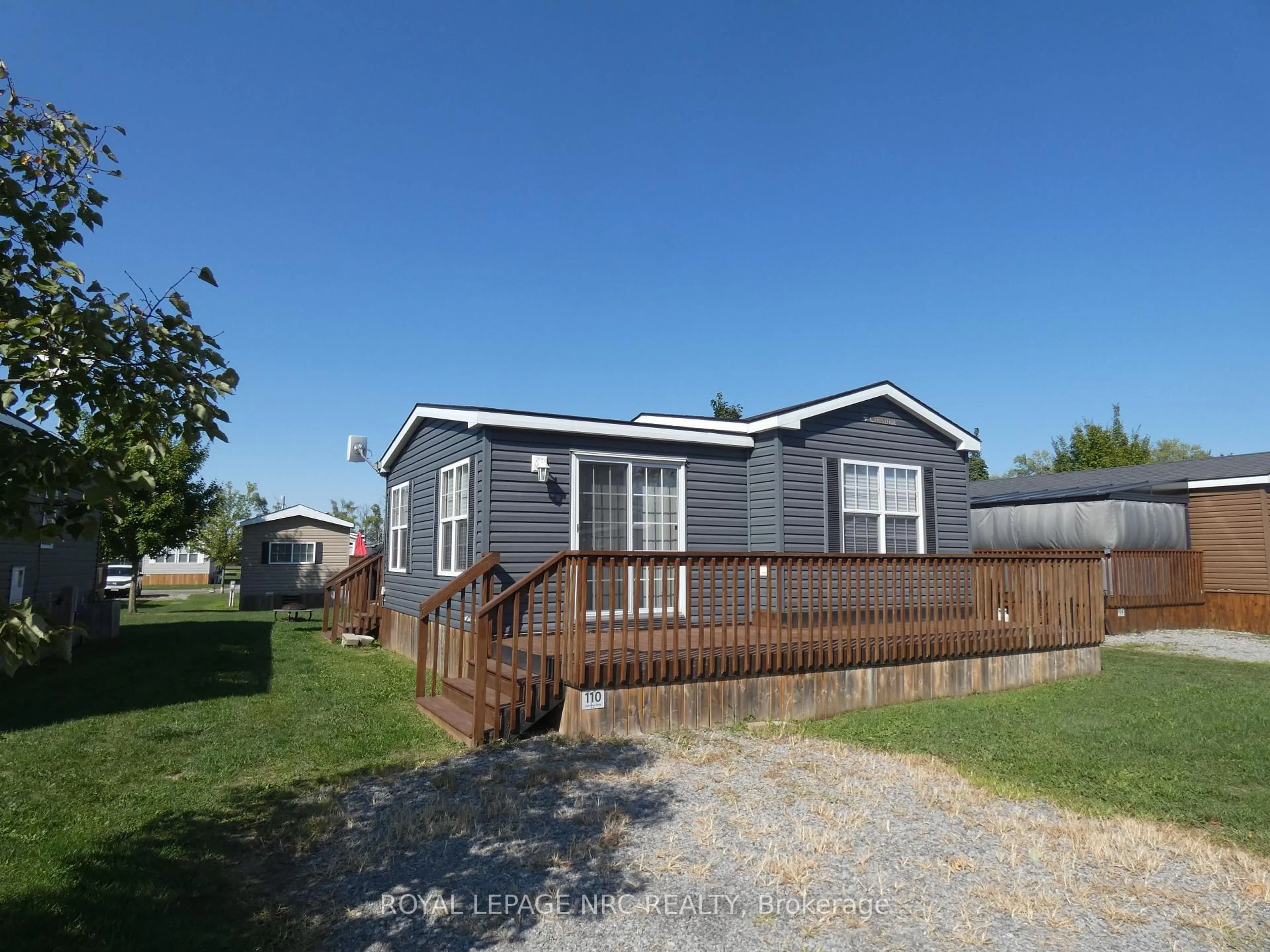 Home with vinyl exterior material, street for 1501 Line 8 Rd #110, Niagara-on-the-Lake Ontario L0S 1J0