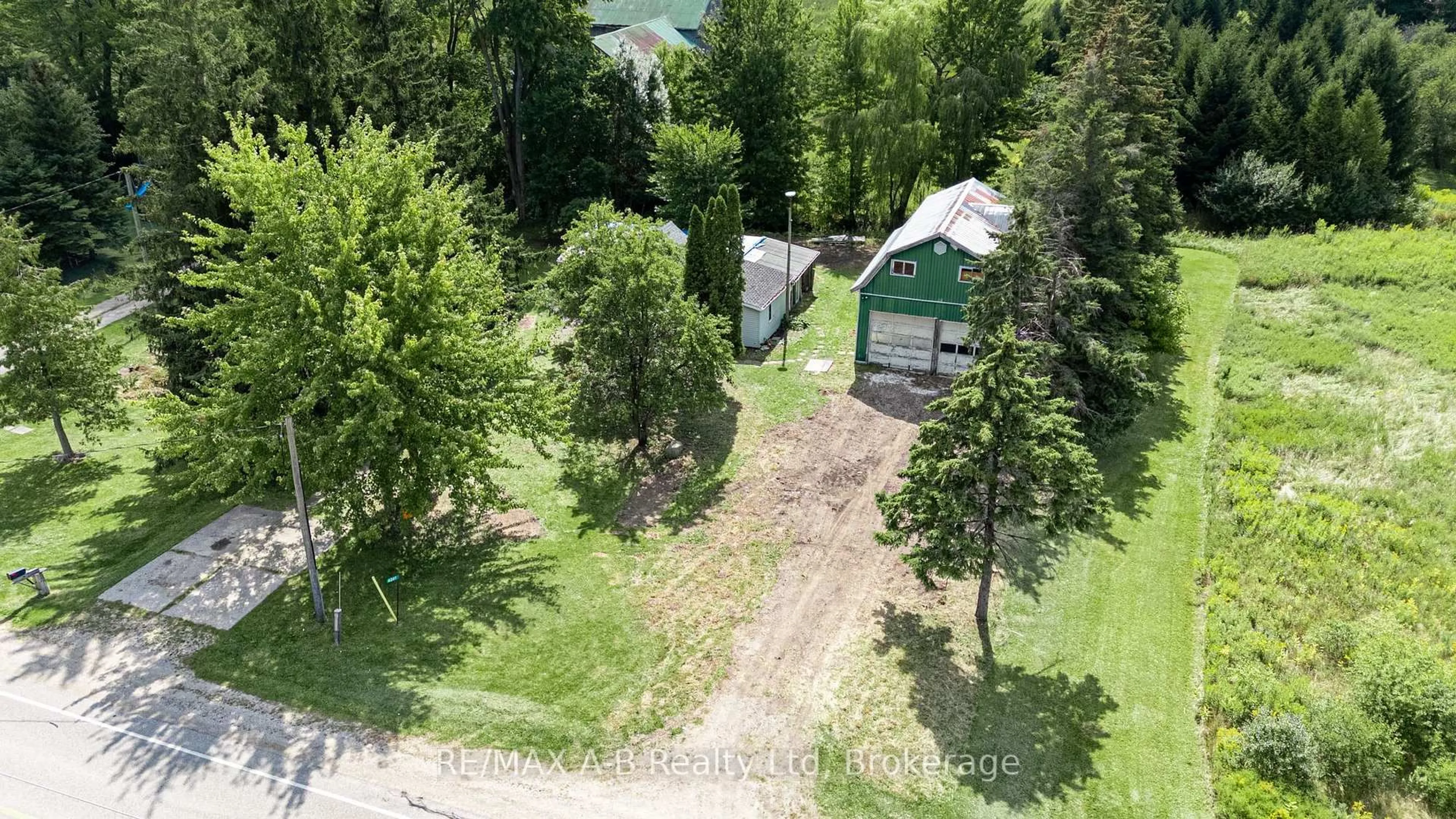 A pic from outside/outdoor area/front of a property/back of a property/a pic from drone, forest/trees view for 4241 Perth Line 36 Line, Stratford Ontario N5A 6S6
