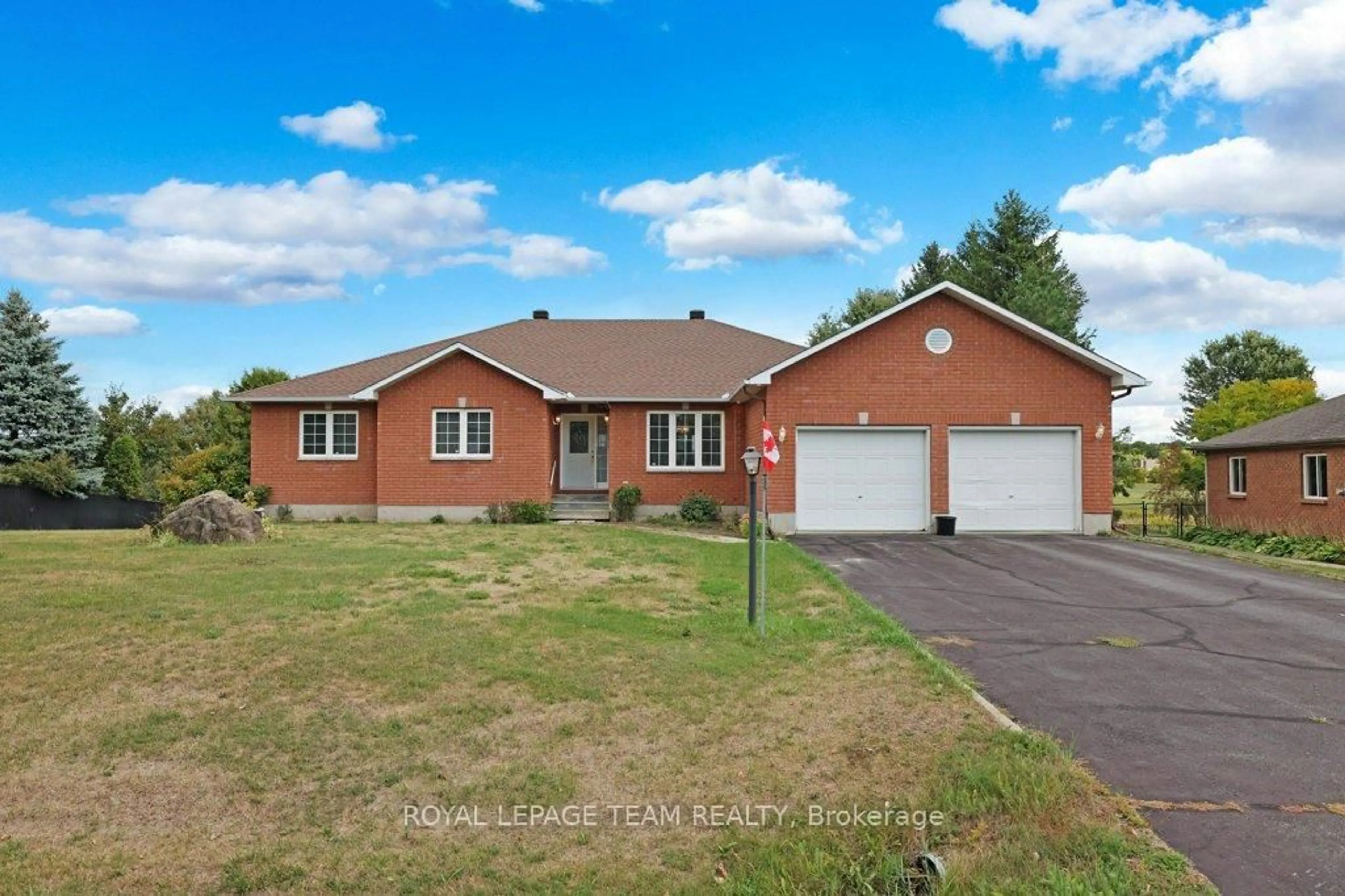 Home with brick exterior material, street for 2120 Trailwood Dr, North Gower Ontario K0A 2T0