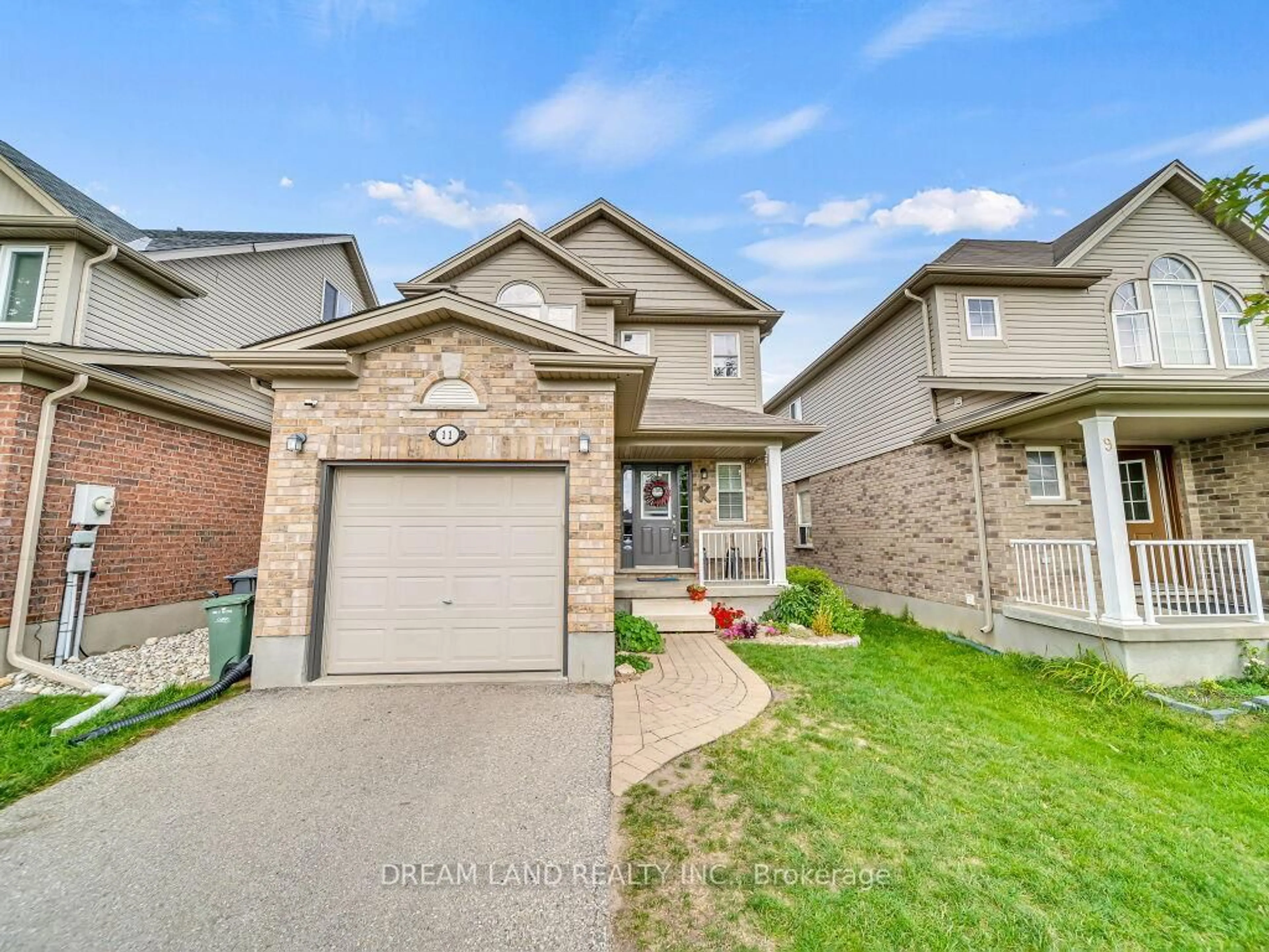 Home with brick exterior material, street for 11 Schiedel Dr, Guelph Ontario N1E 0C9
