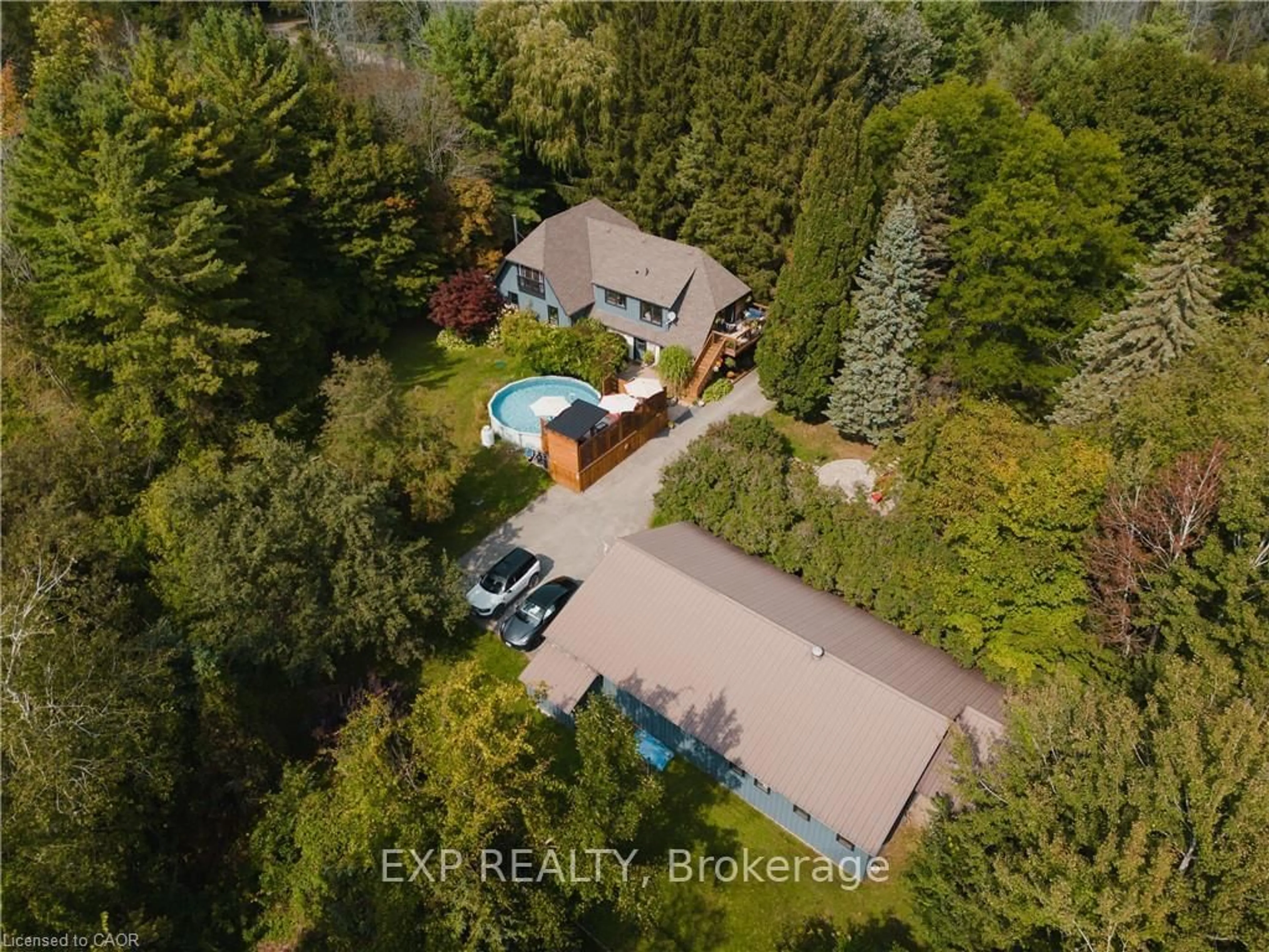 A pic from outside/outdoor area/front of a property/back of a property/a pic from drone, forest/trees view for 5794 Tenth Line, Erin Ontario N0B 1T0