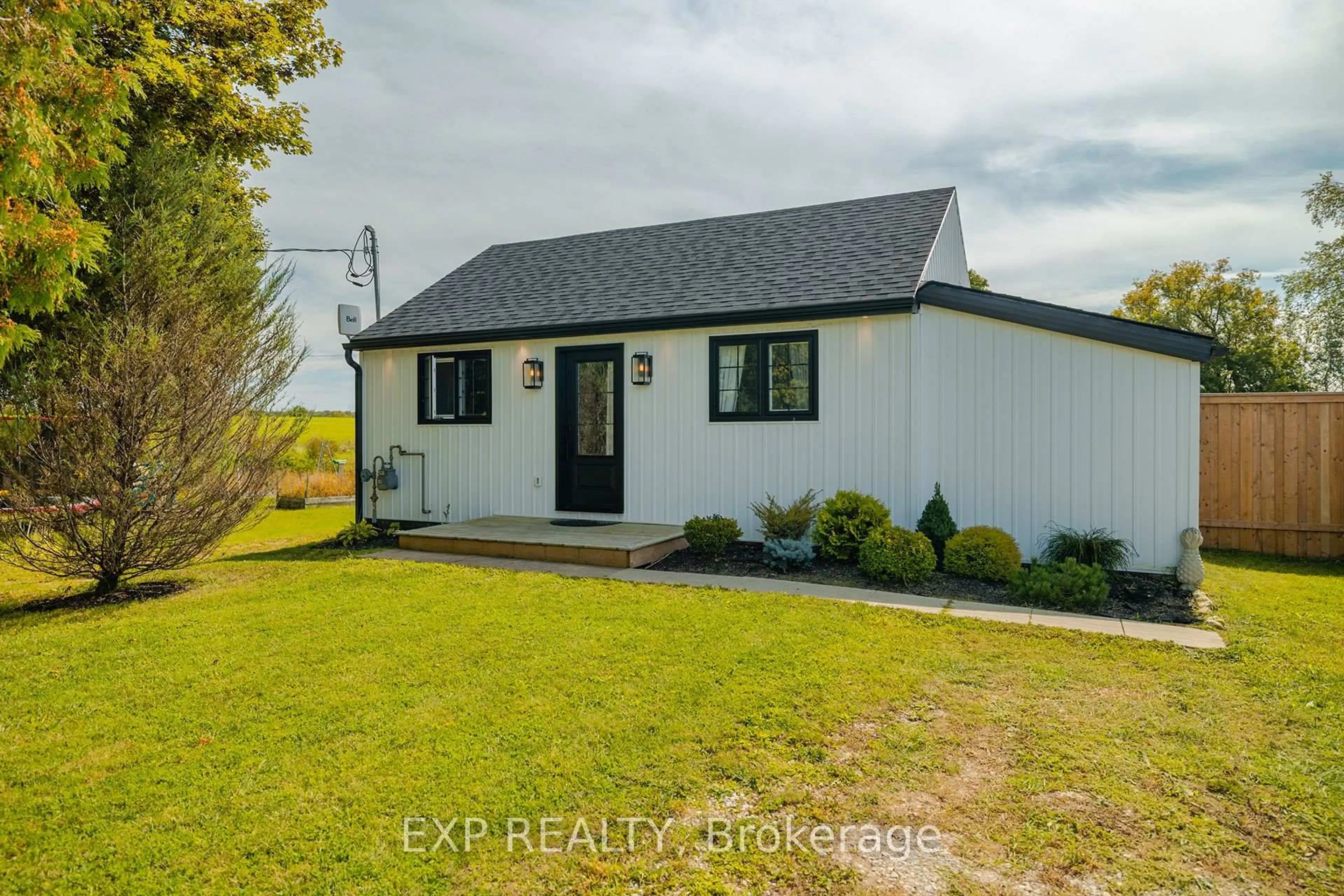A pic from outside/outdoor area/front of a property/back of a property/a pic from drone, water/lake/river/ocean view for 401250 Grey 4 Rd, West Grey Ontario N4N 3B8