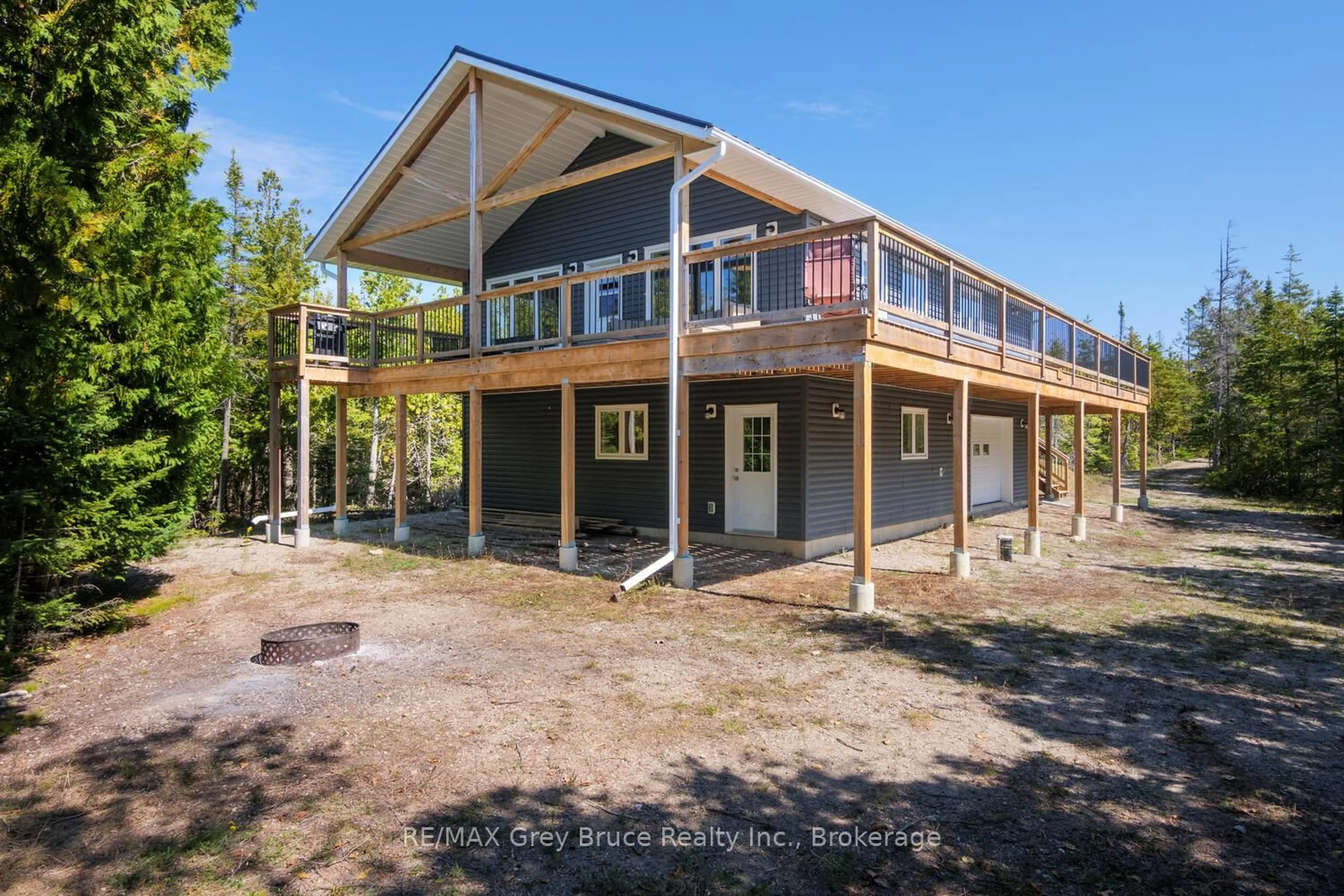 A pic from outside/outdoor area/front of a property/back of a property/a pic from drone, building for 38 Bay Shore Ave, Northern Bruce Peninsula Ontario N0H 2R0