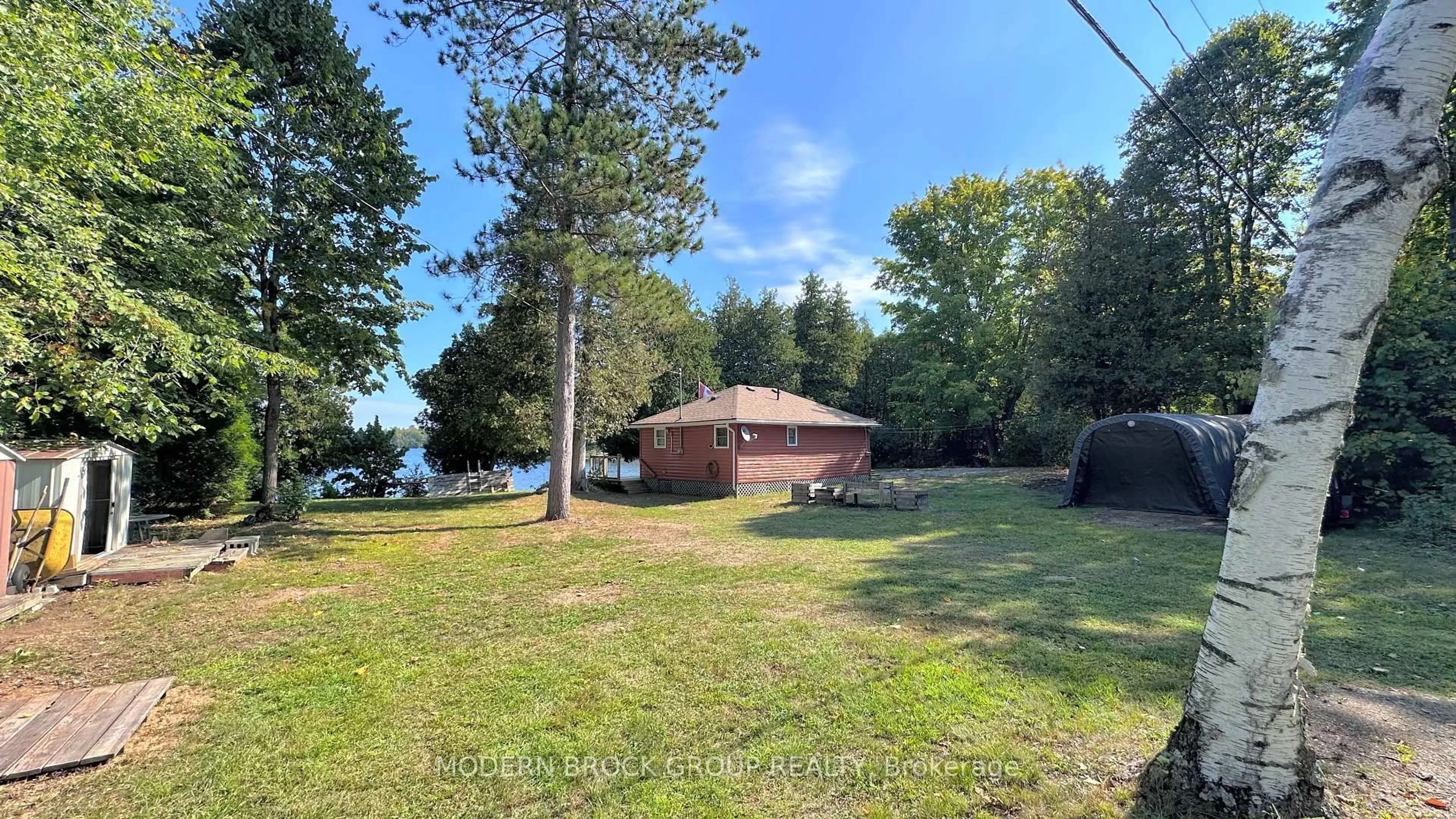 A pic from outside/outdoor area/front of a property/back of a property/a pic from drone, water/lake/river/ocean view for 1221 LB12 Rd, Rideau Lakes Ontario K0E 1G0