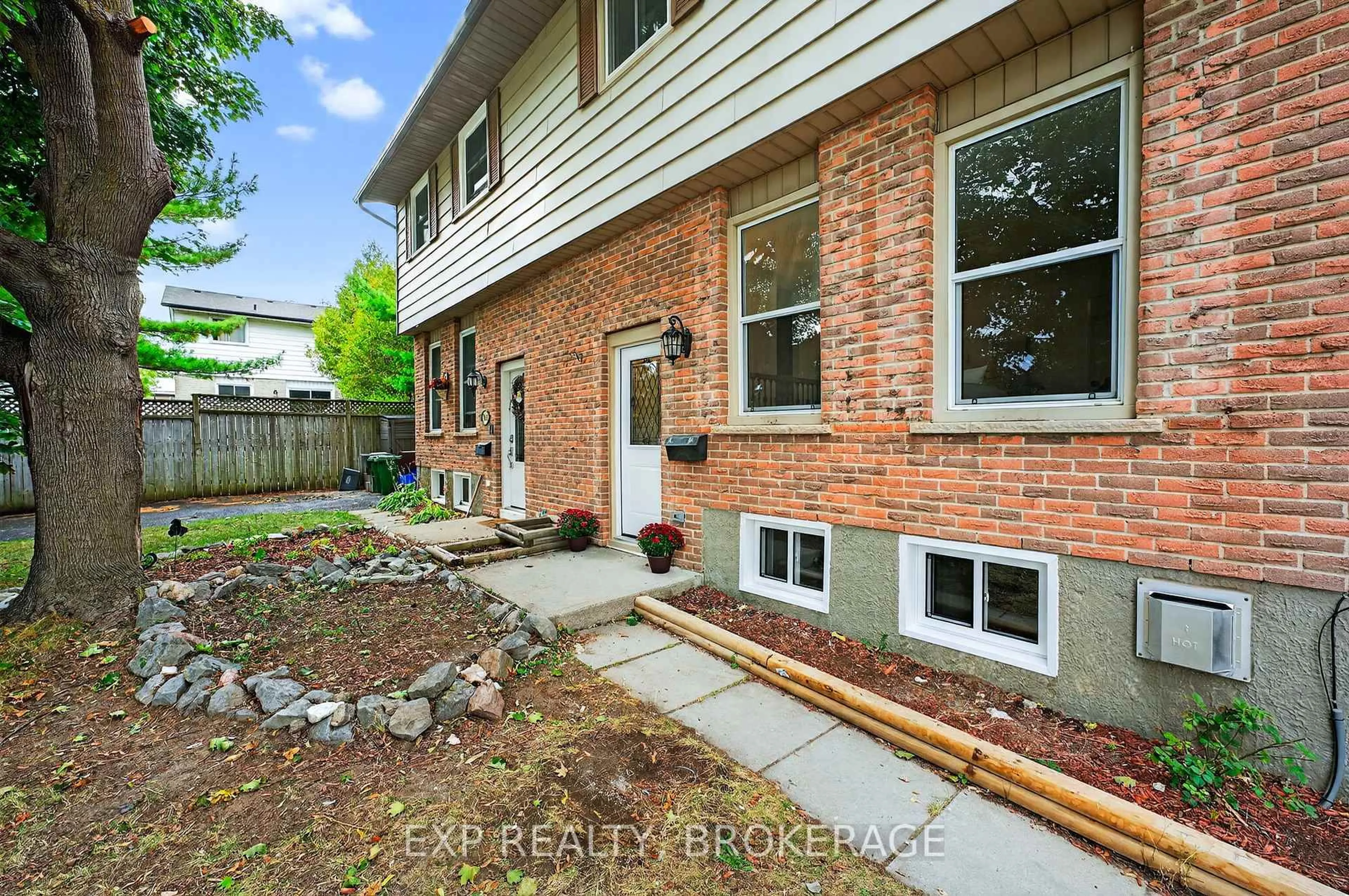 Home with brick exterior material, street for 834 CEDARWOOD Dr, Kingston Ontario K7P 1K8