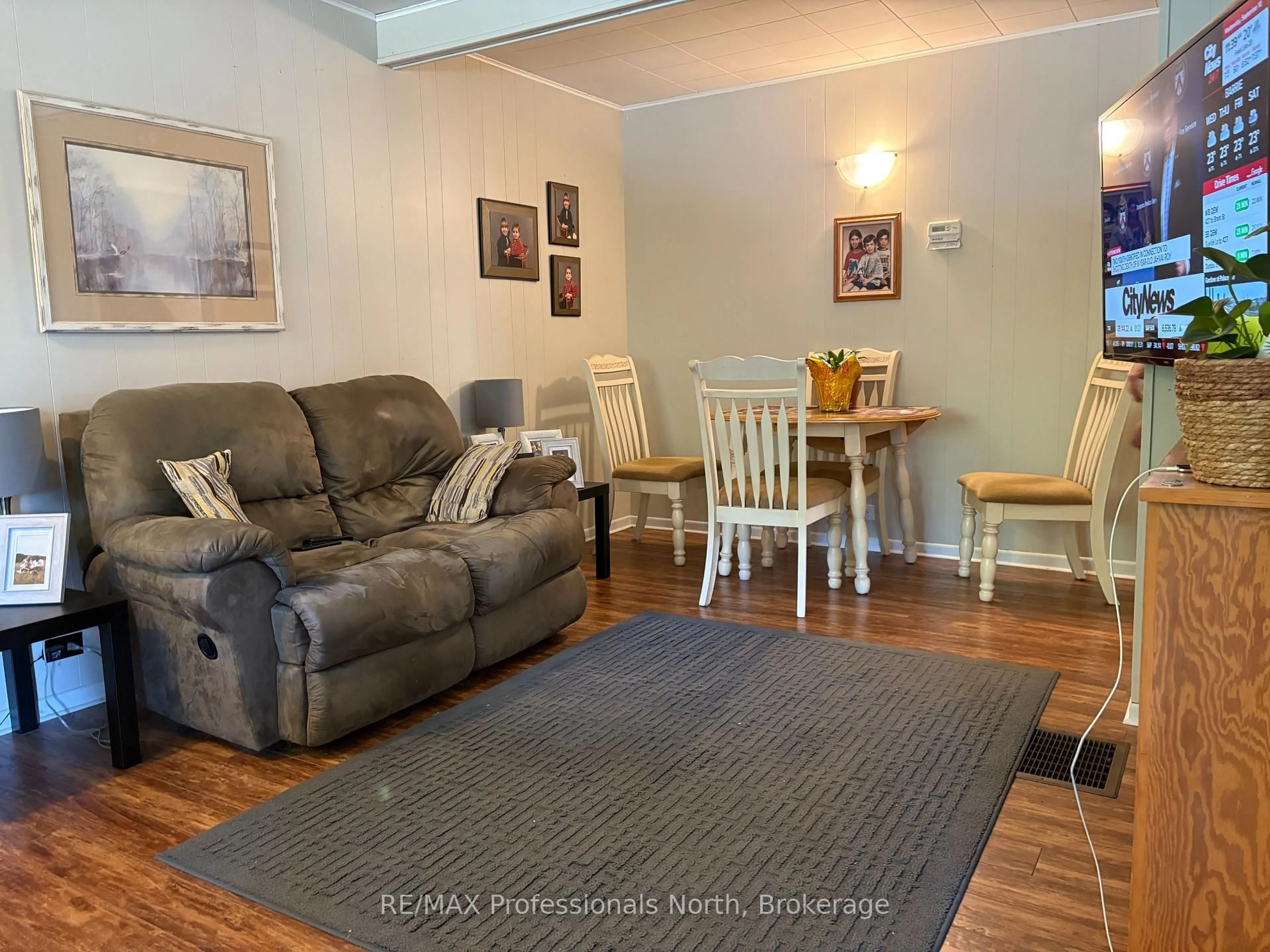 Living room with furniture, unknown for 2 South Fetterly St, Huntsville Ontario P1H 1K7
