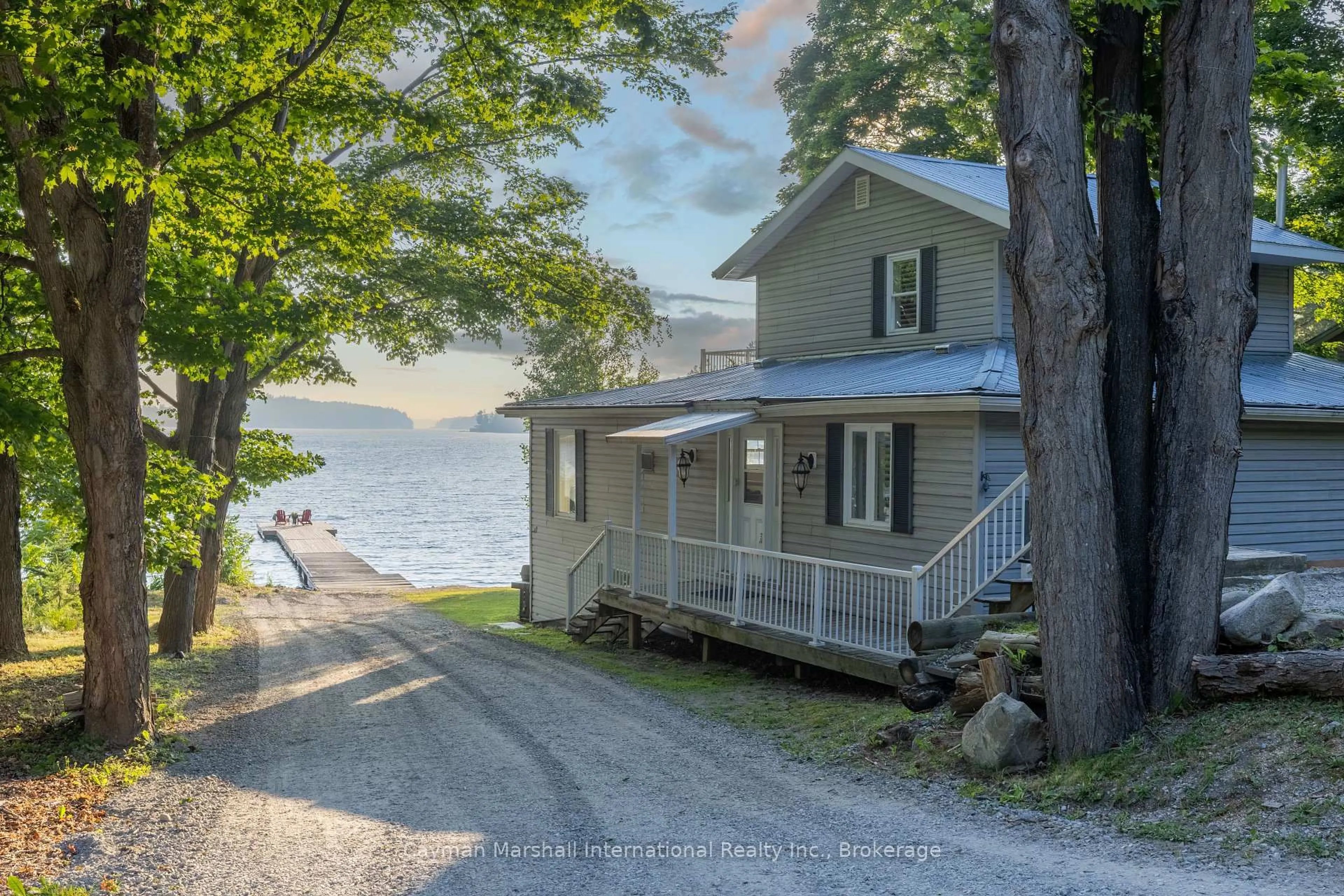 A pic from outside/outdoor area/front of a property/back of a property/a pic from drone, water/lake/river/ocean view for 1509 Muskoka Road 118 Rd, Muskoka Lakes Ontario P1L 1W8