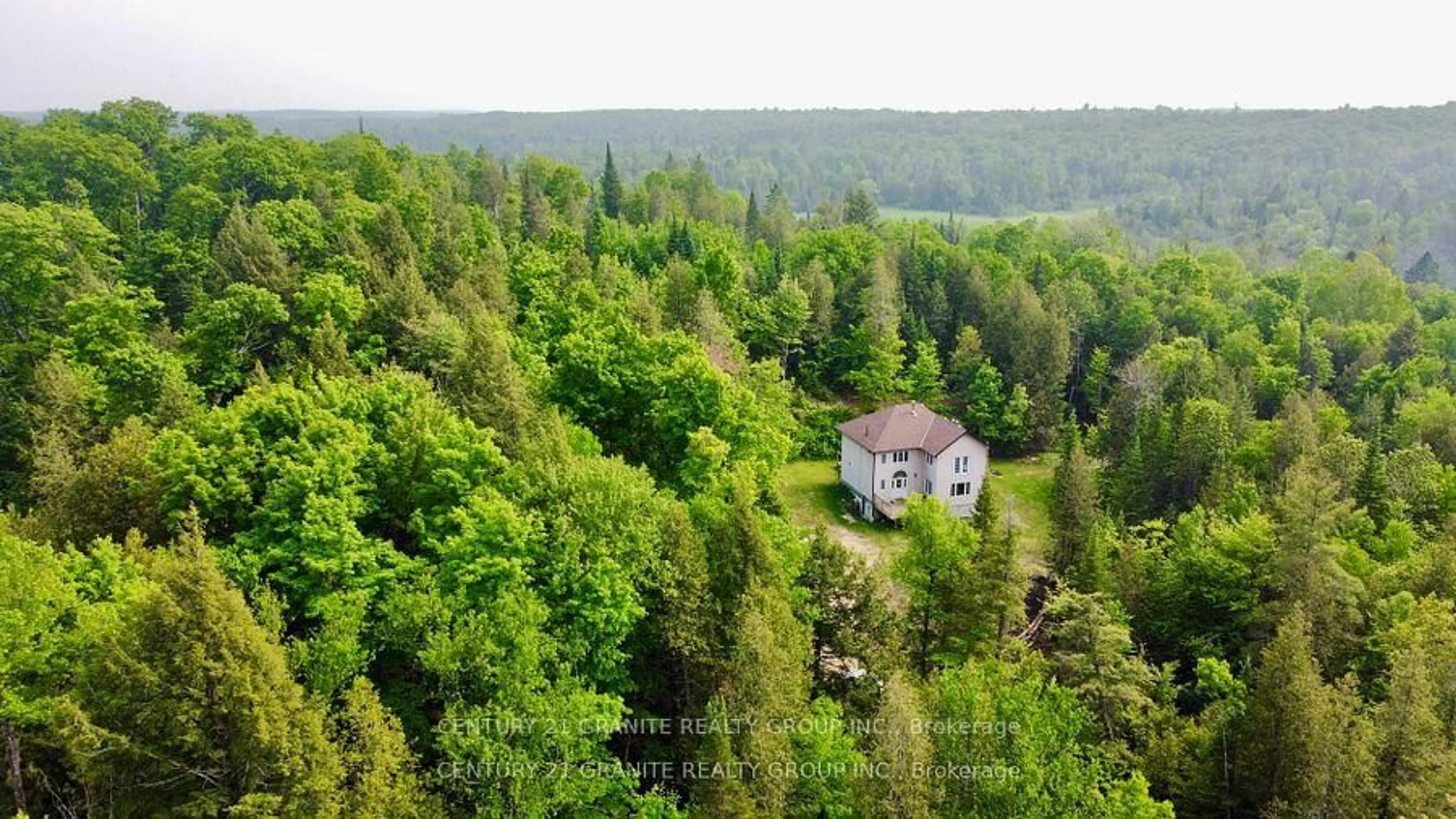 A pic from outside/outdoor area/front of a property/back of a property/a pic from drone, forest/trees view for 1049 Limerick Lake Rd, Hastings Ontario K0L 1W0