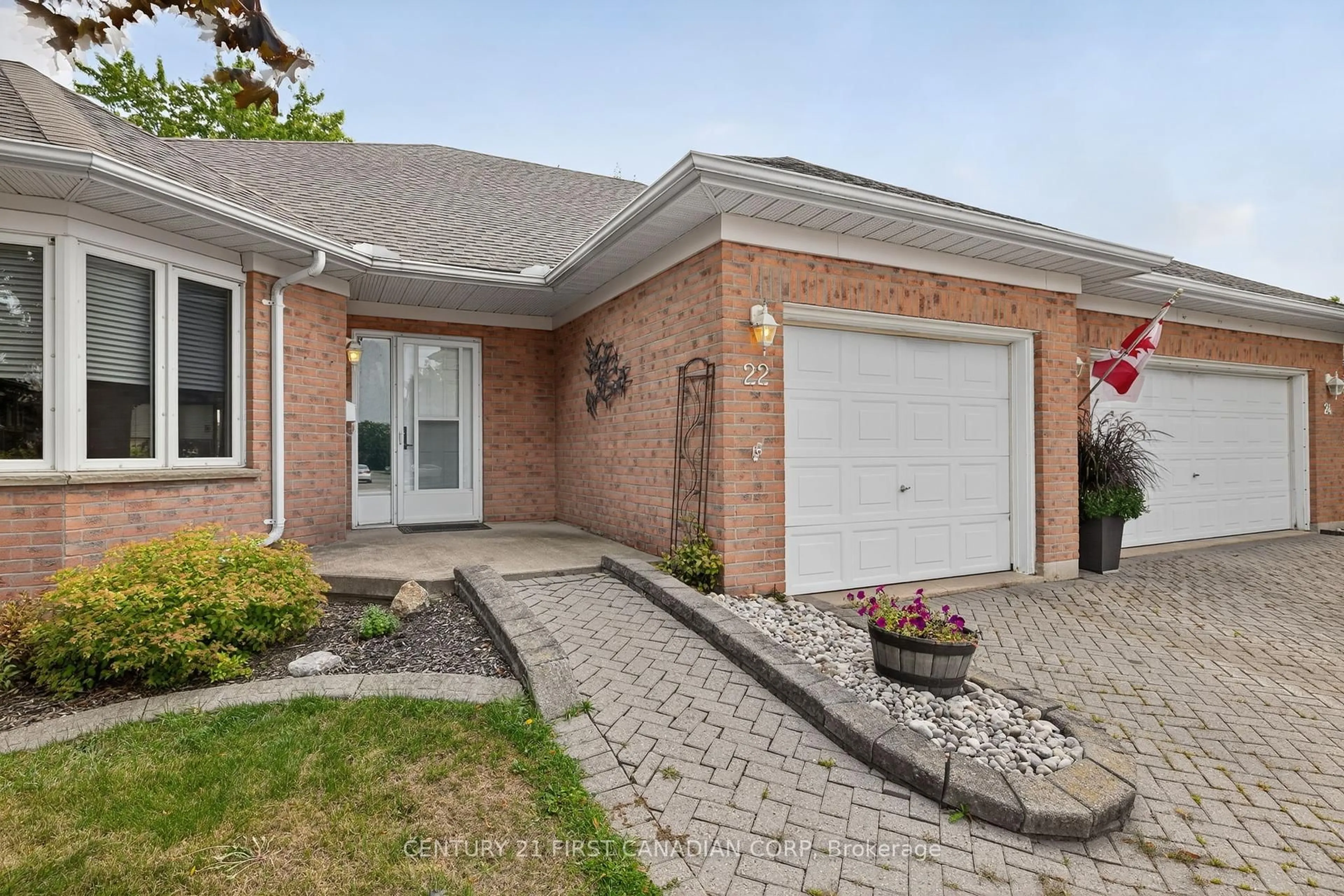 Home with brick exterior material, street for 22 Ilderbrook Circ, Middlesex Centre Ontario N0M 2A0