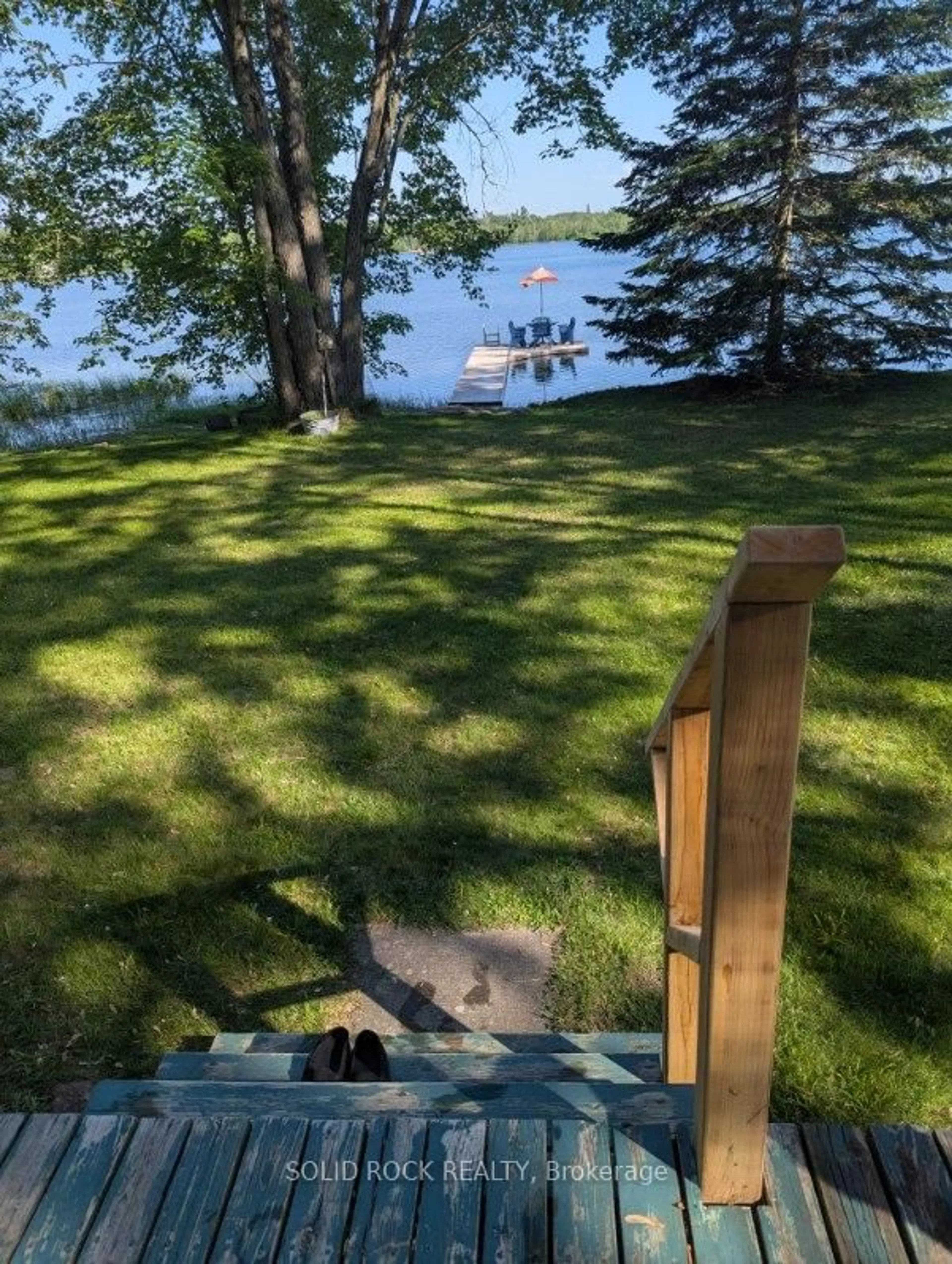 A pic from outside/outdoor area/front of a property/back of a property/a pic from drone, water/lake/river/ocean view for 98 Mcleish Dr, Kawartha Lakes Ontario L0K 1W0