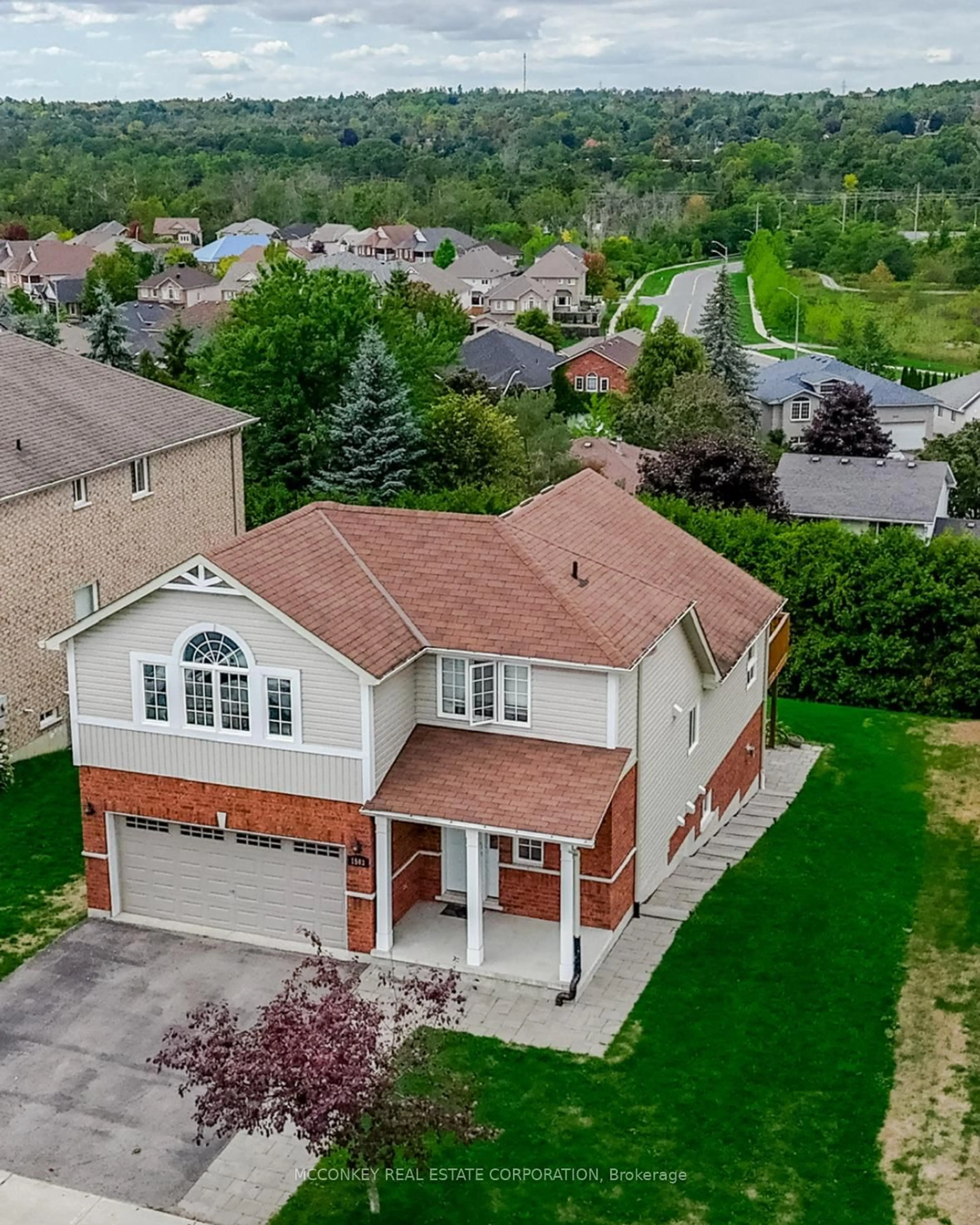 A pic from outside/outdoor area/front of a property/back of a property/a pic from drone, street for 1563 Scollard Cres, Peterborough Ontario K9H 0A8