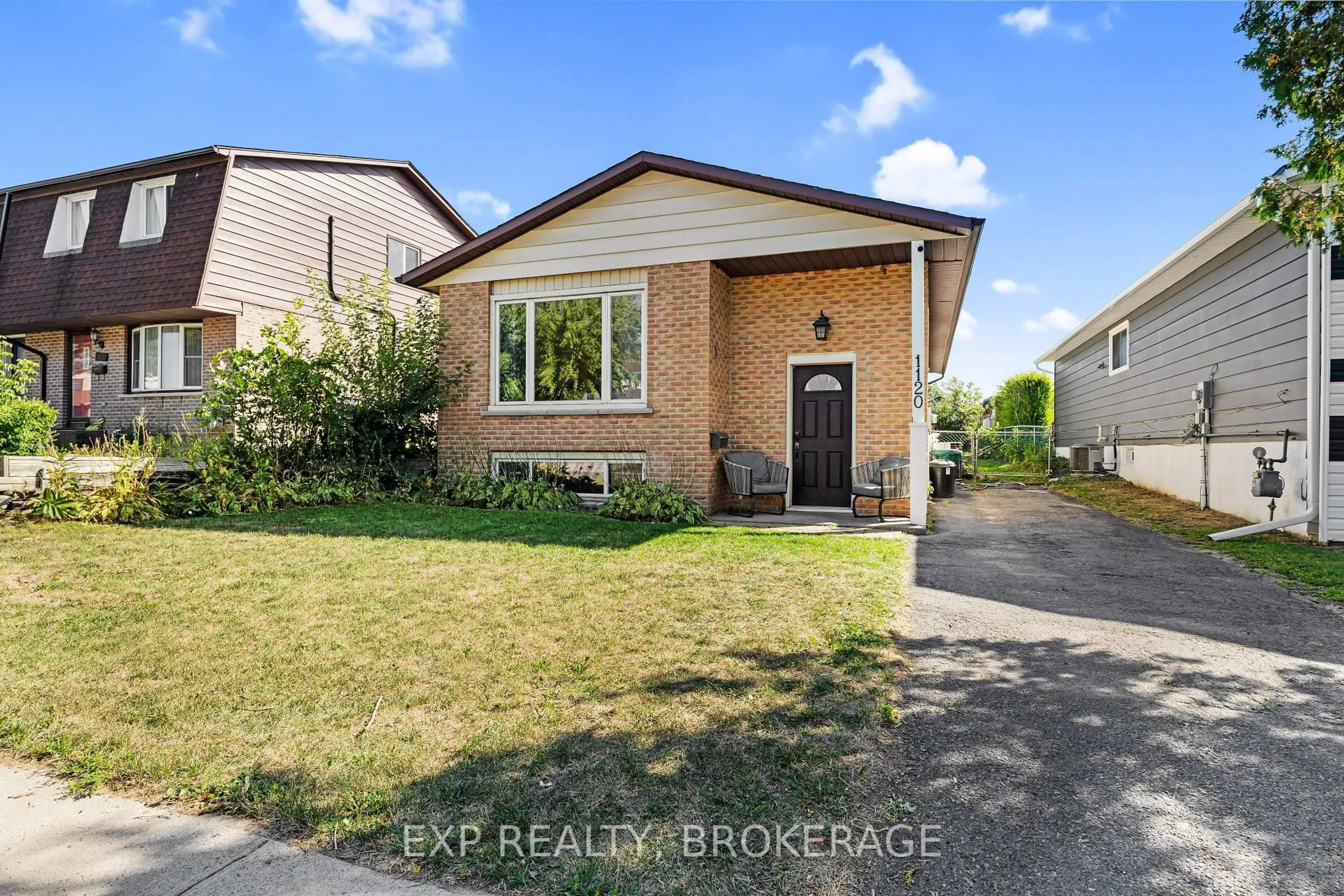 Home with brick exterior material, street for 1120 BASSWOOD Pl, Kingston Ontario K7P 1K6