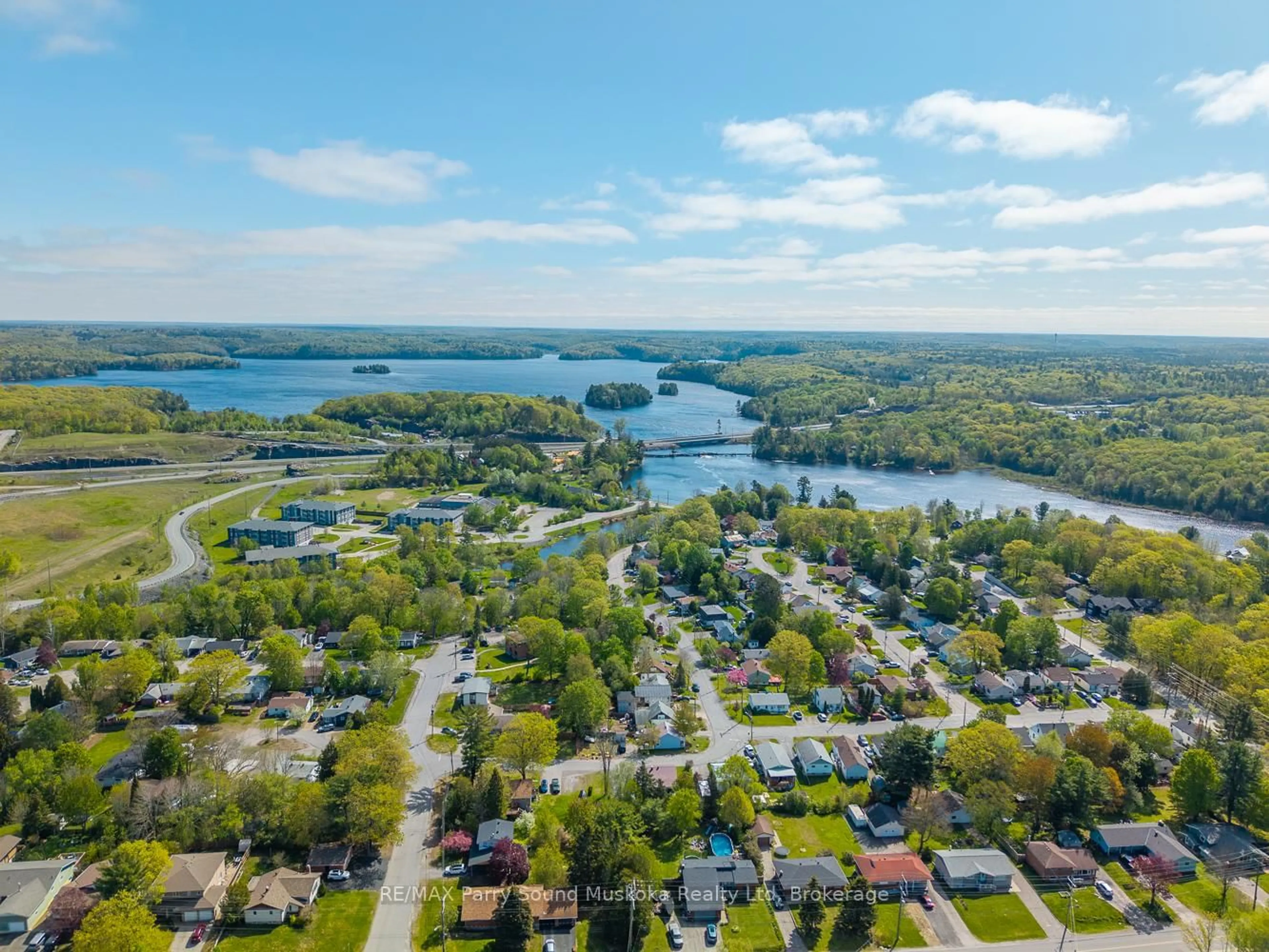 A pic from outside/outdoor area/front of a property/back of a property/a pic from drone, water/lake/river/ocean view for 44 Dennis Dr, Parry Sound Ontario P2A 0E6