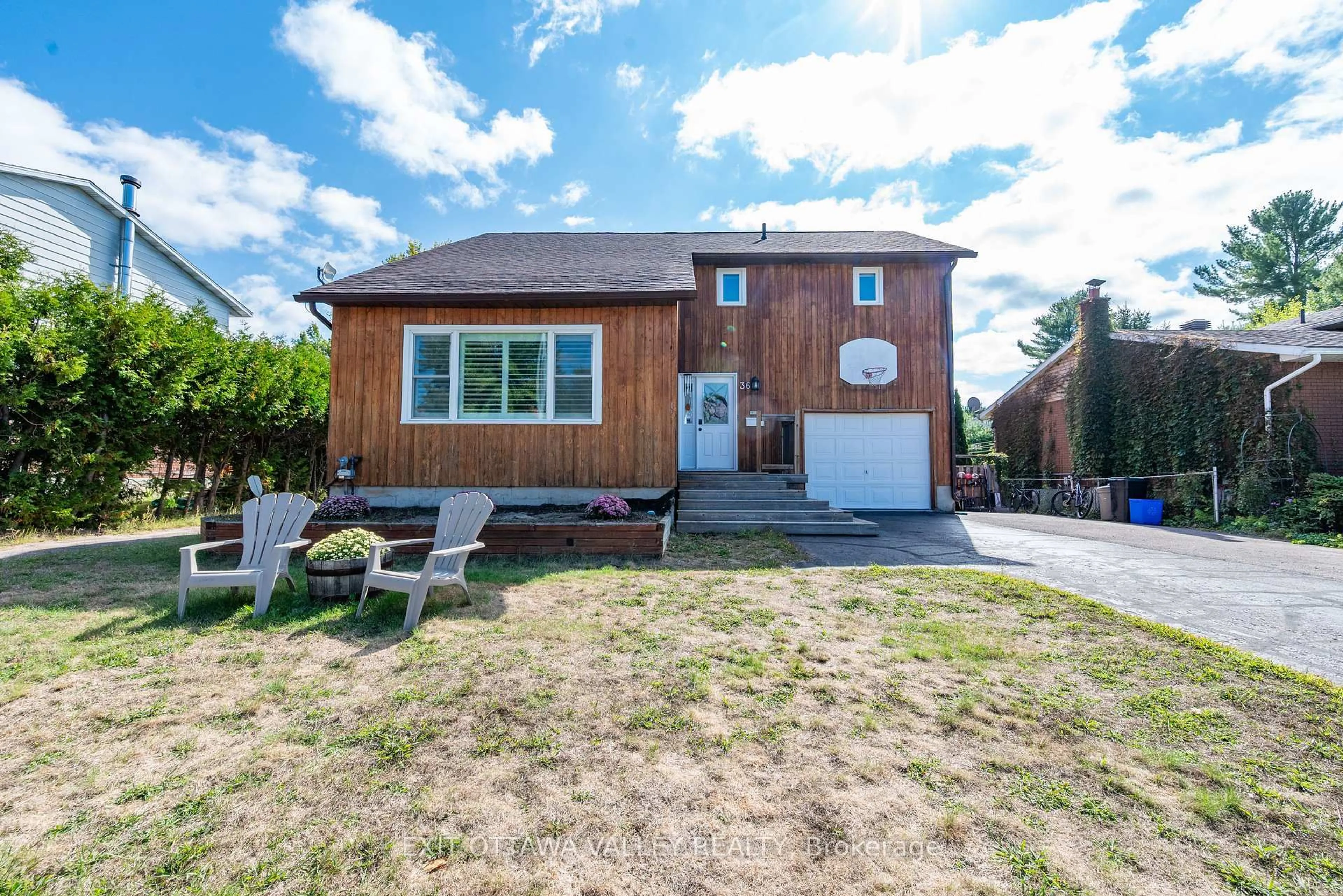 Home with brick exterior material, street for 36 Thomas St, Deep River Ontario K0J 1P0