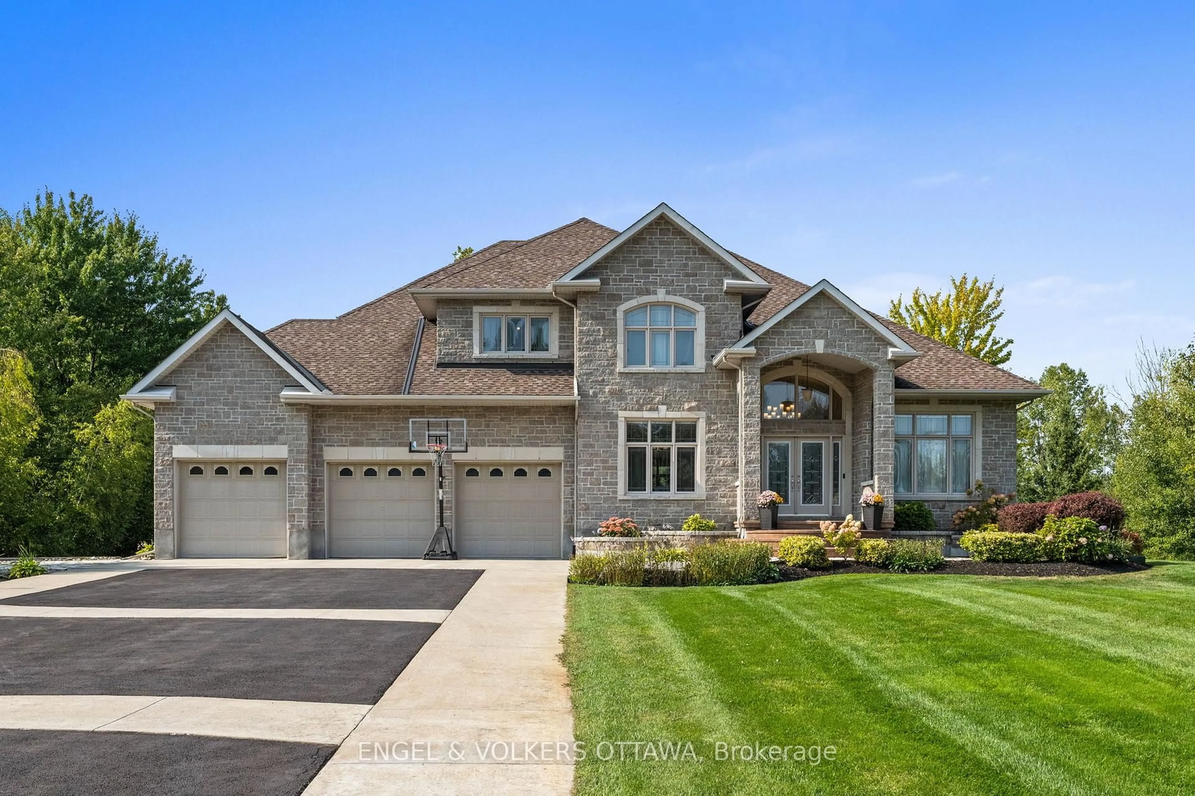 Home with brick exterior material, street for 1028 Rick Hansen Cres, Ottawa Ontario K4P 1M4
