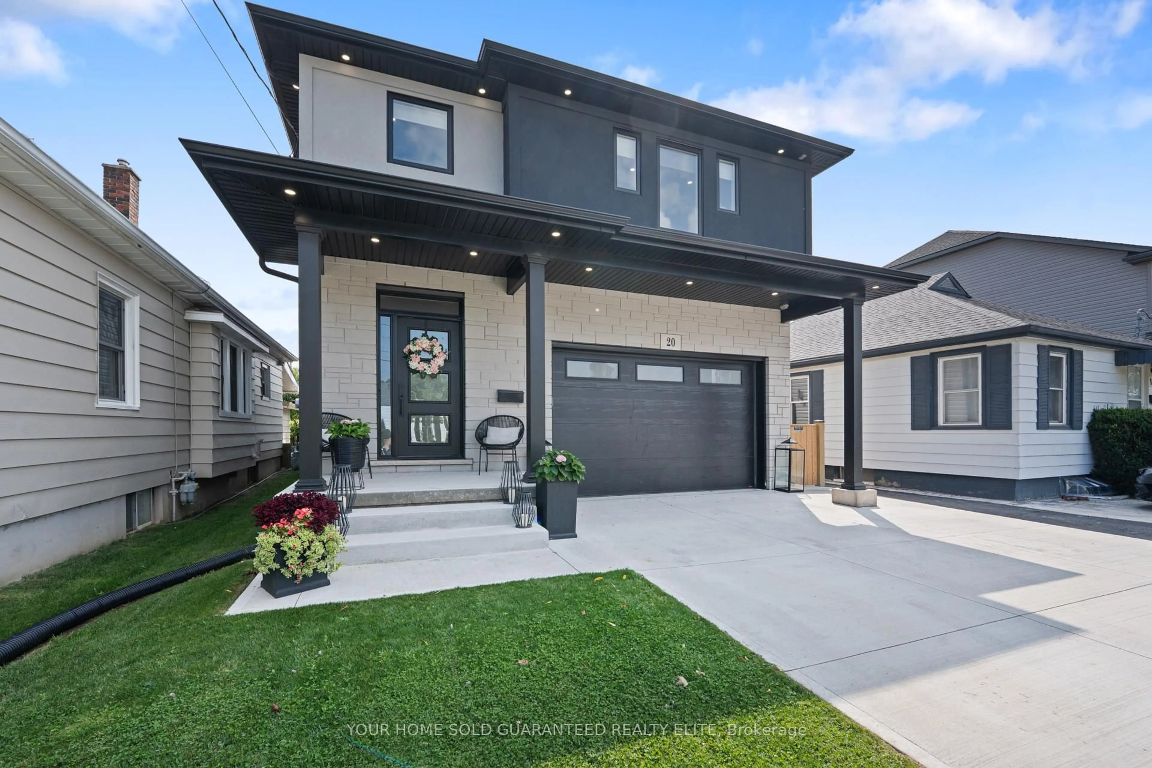 Home with vinyl exterior material, street for 20 Prospect Ave, St. Catharines Ontario L2M 5K1