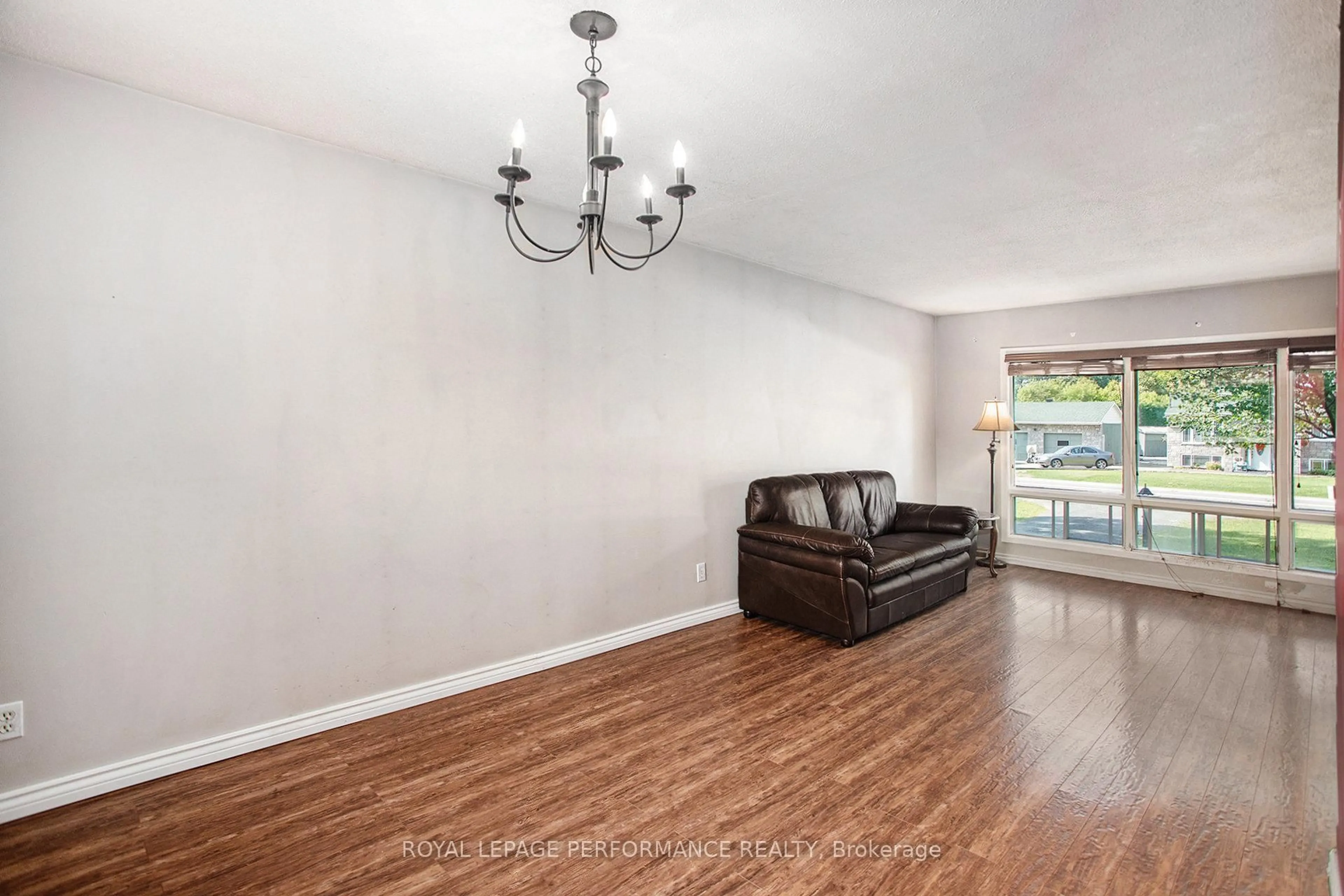 Living room with furniture, wood/laminate floor for 5803 Rockdale Rd, Vars Ontario K0A 3H0