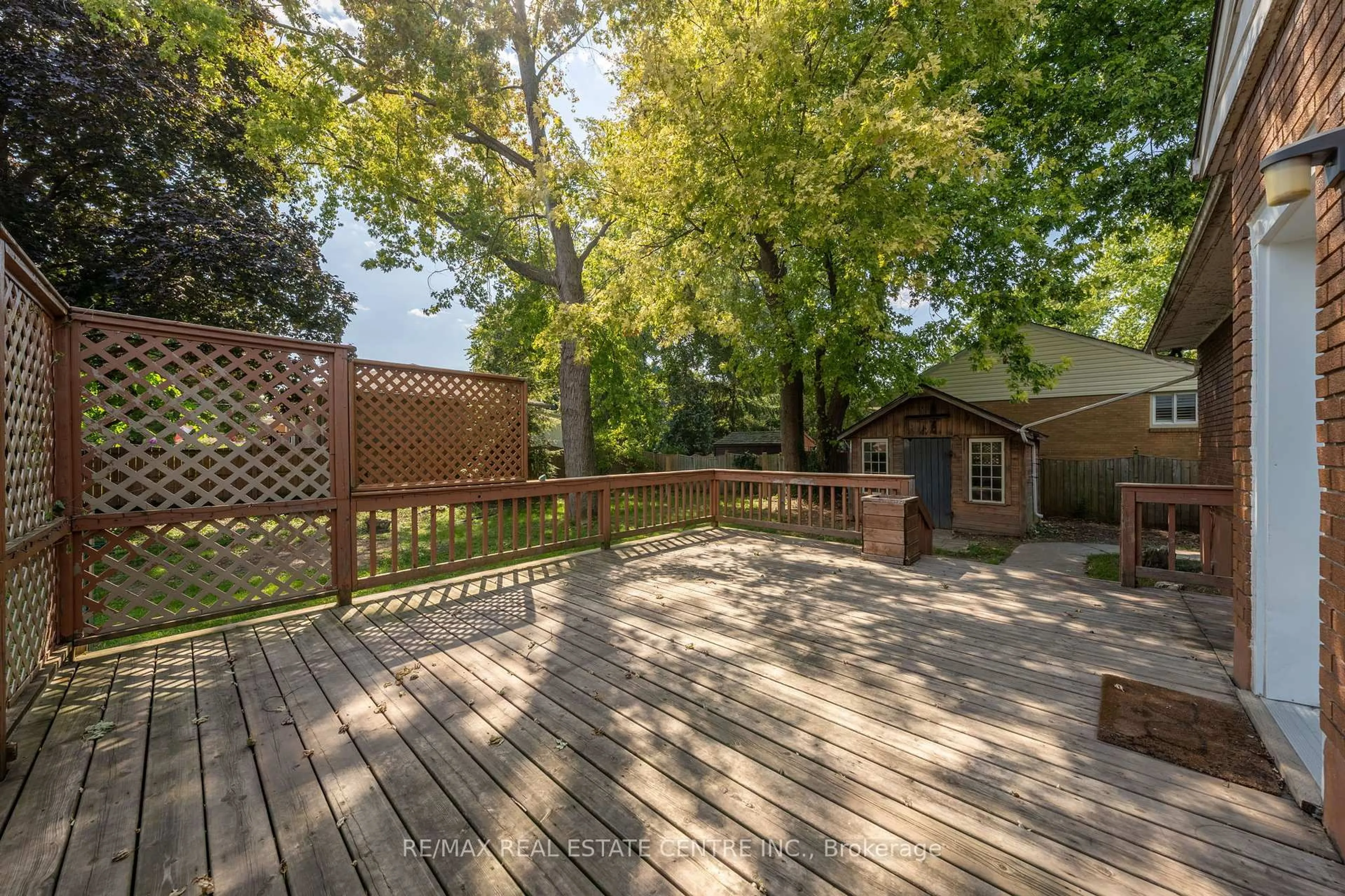 Patio, forest/trees view for 601 Hollywood Pl, Sarnia Ontario N7V 2J1