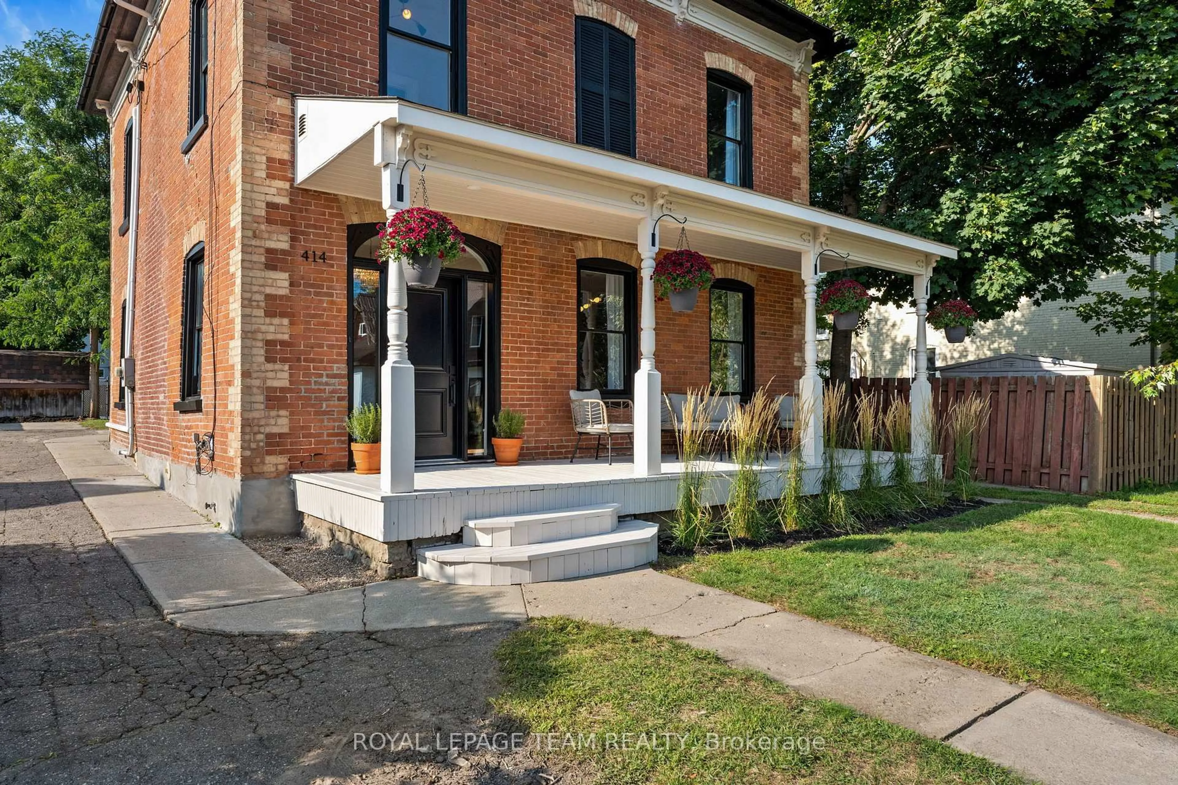 Home with brick exterior material, street for 414 James St, Prescott Ontario K0E 1T0