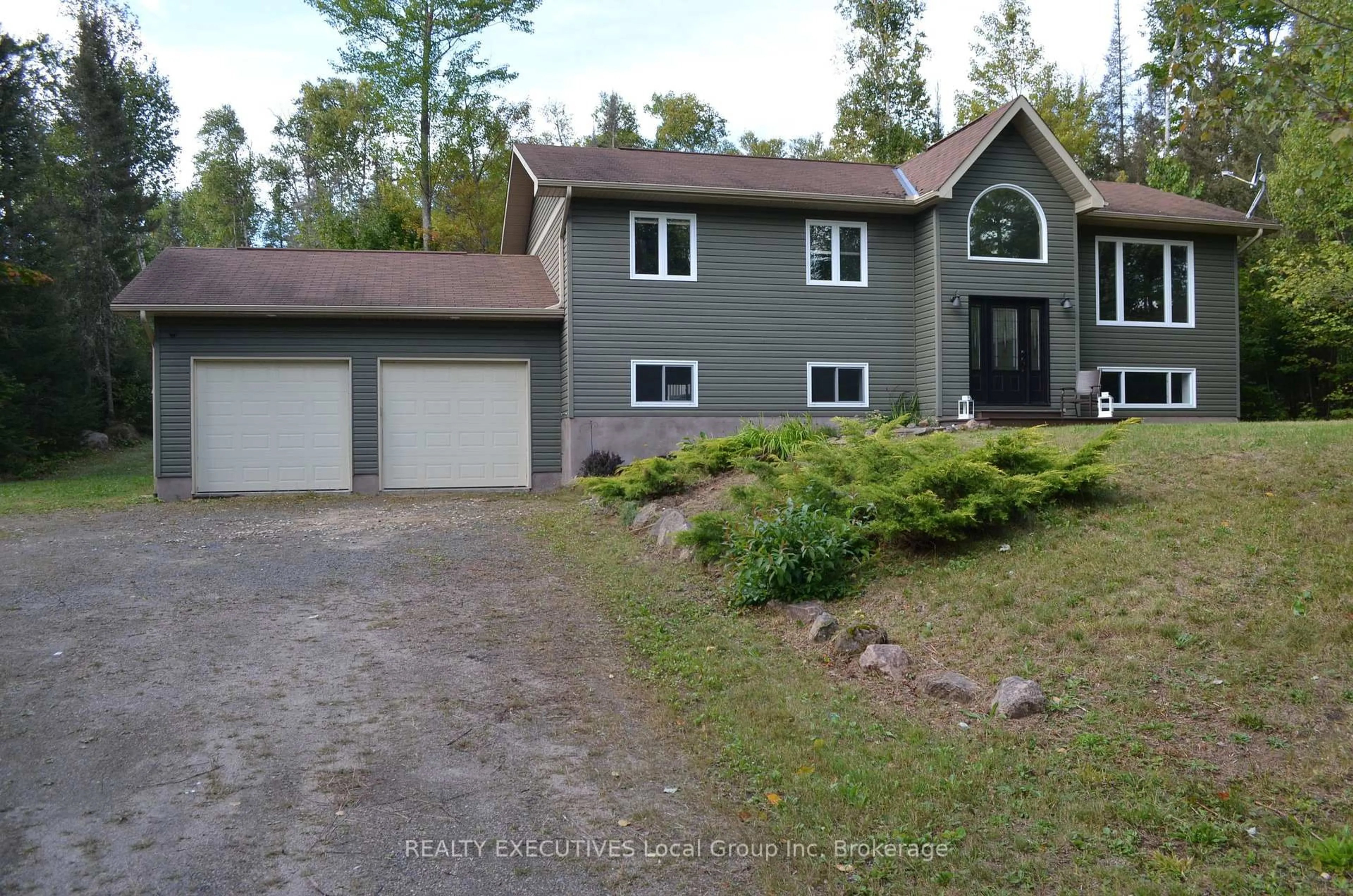 A pic from outside/outdoor area/front of a property/back of a property/a pic from drone, street for 581 Ouellette Rd, East Ferris Ontario P0H 1K0
