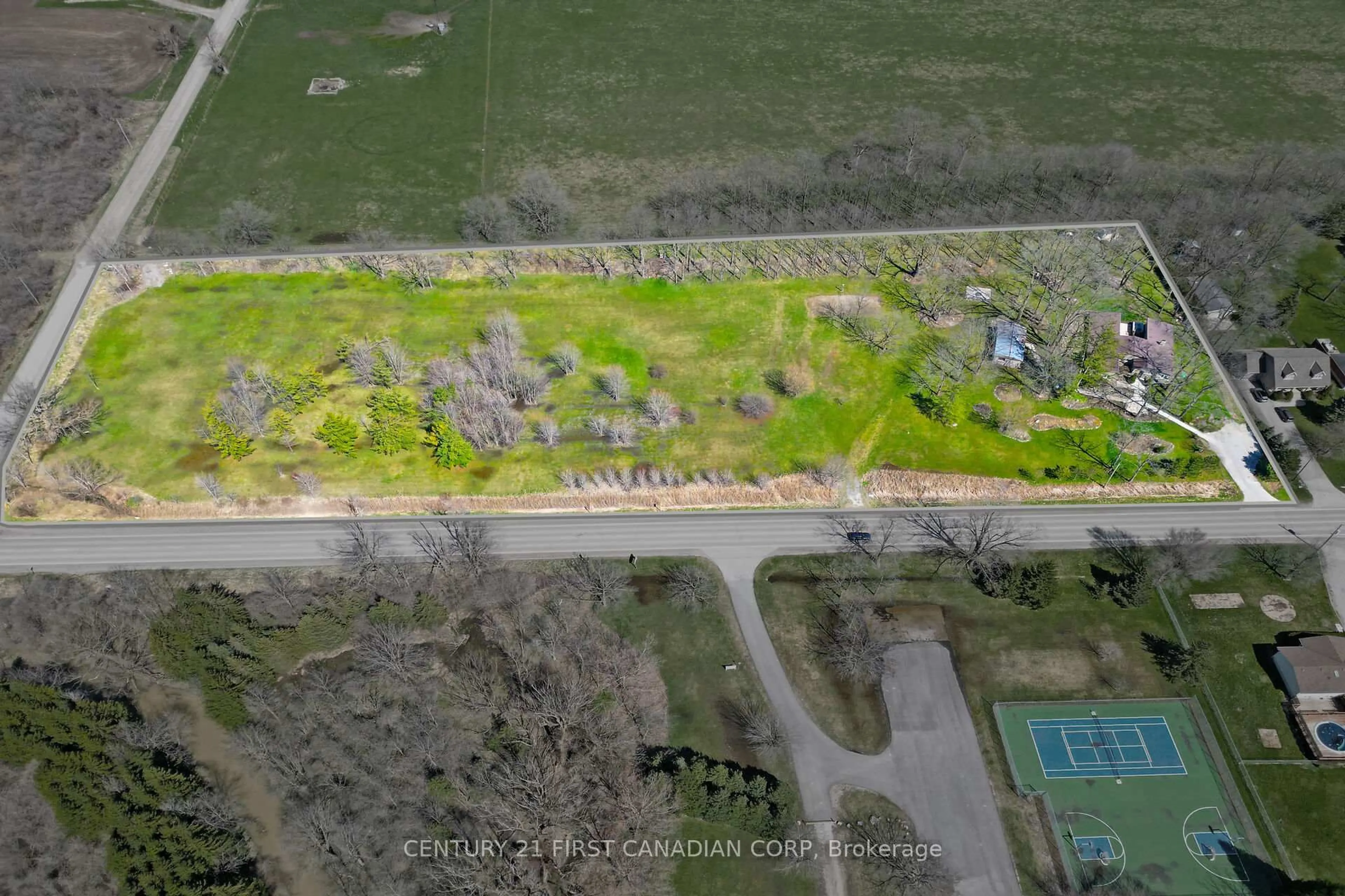 A pic from outside/outdoor area/front of a property/back of a property/a pic from drone, street for 23992 Denfield Rd, Middlesex Centre Ontario N0M 1P0