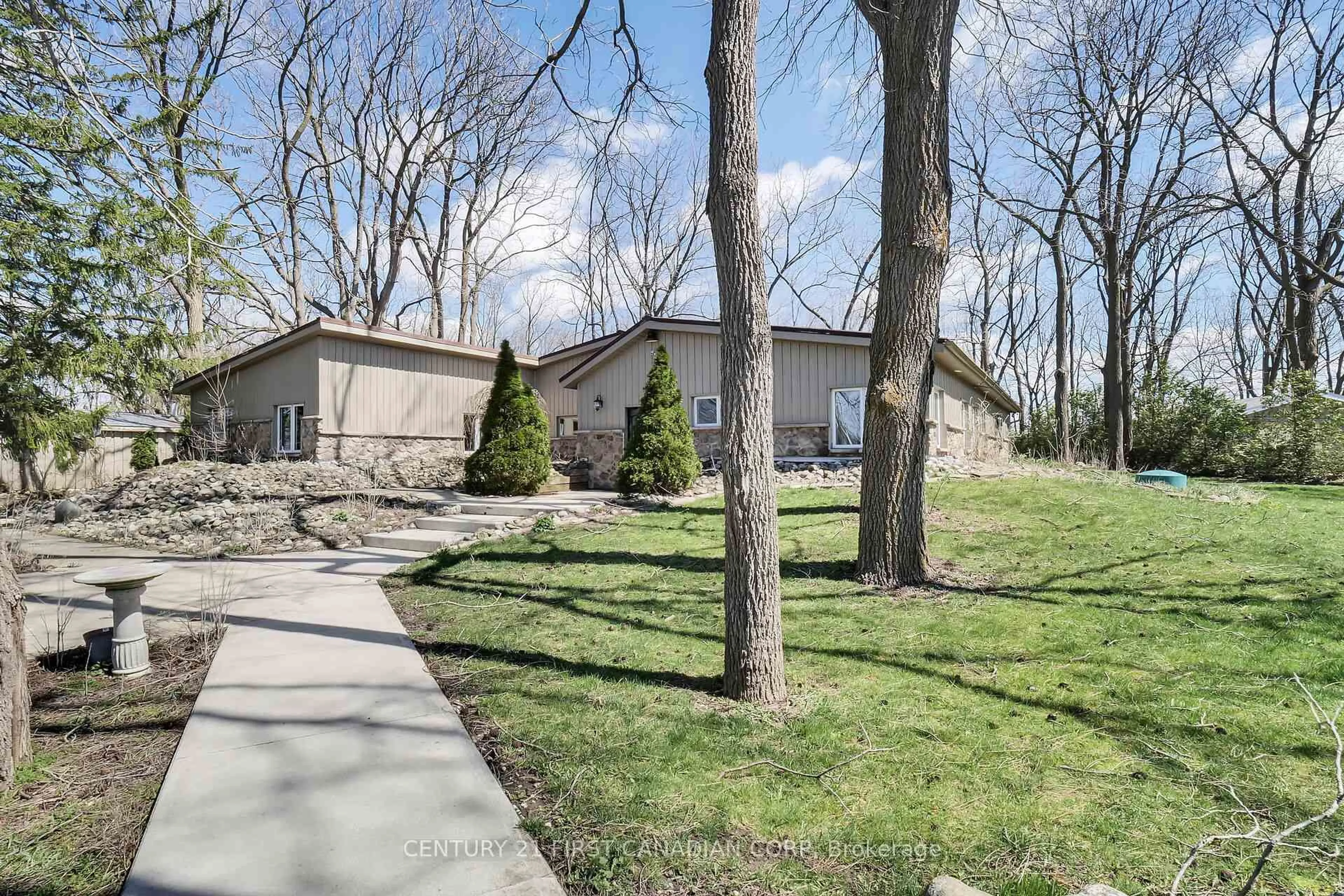 A pic from outside/outdoor area/front of a property/back of a property/a pic from drone, street for 23992 Denfield Rd, Middlesex Centre Ontario N0M 1P0