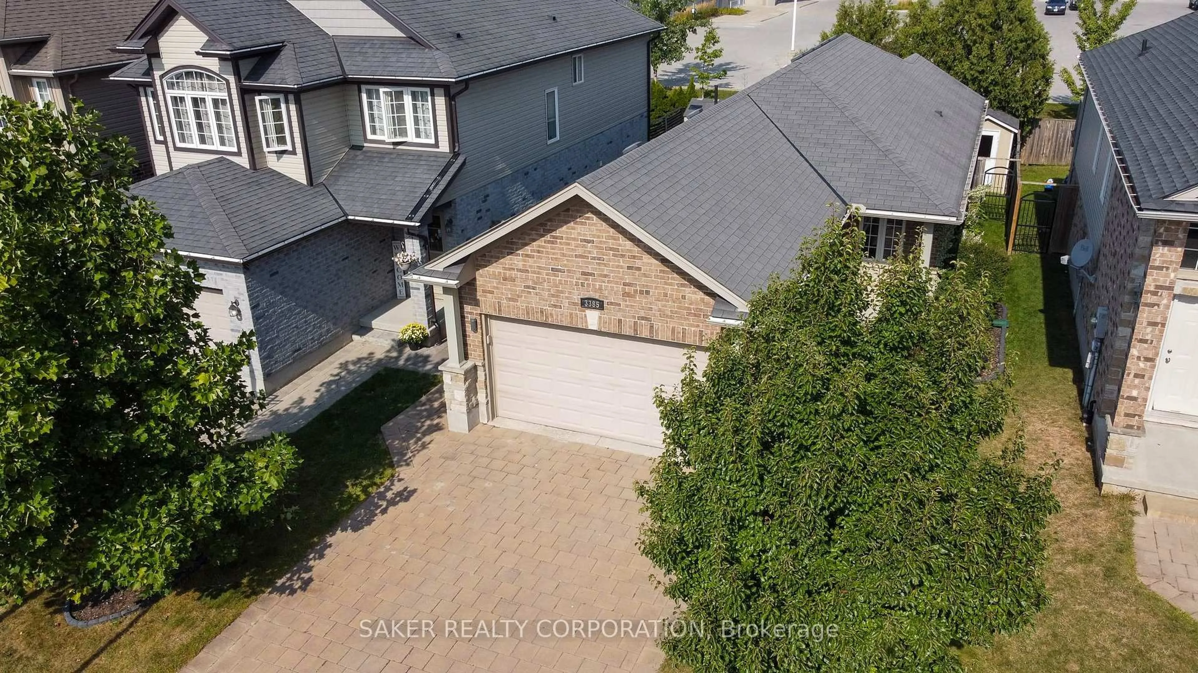 A pic from outside/outdoor area/front of a property/back of a property/a pic from drone, street for 3385 EMILYCARR Lane, London South Ontario N6L 0A3