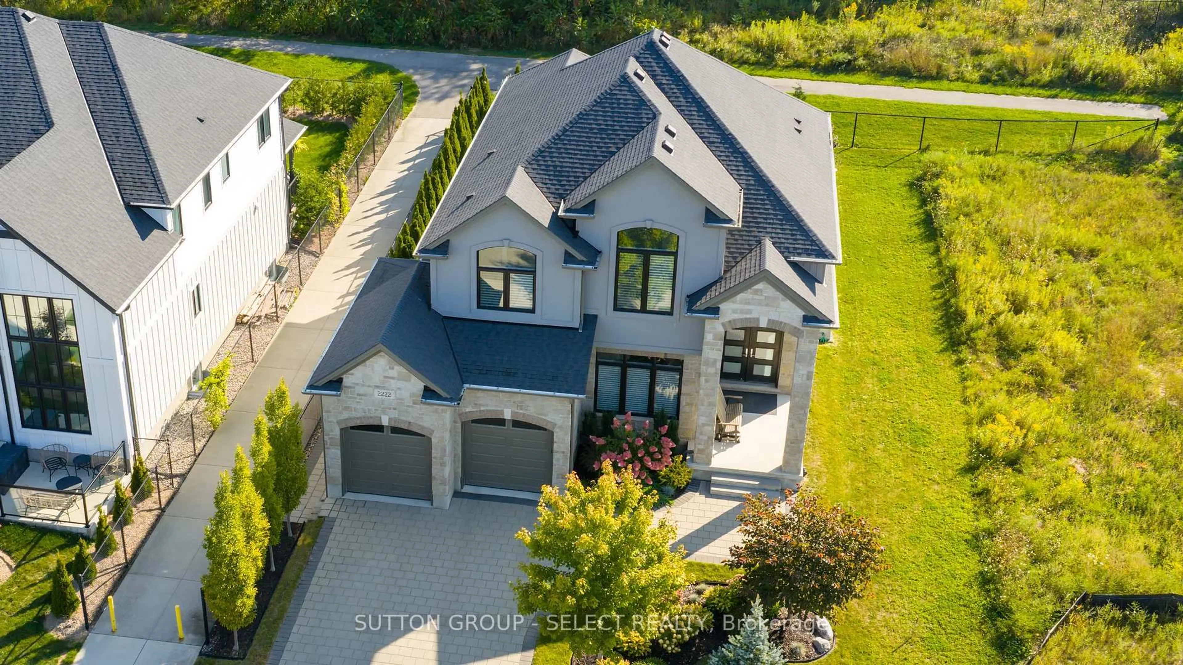 A pic from outside/outdoor area/front of a property/back of a property/a pic from drone, street for 2222 Ironwood Rd, London South Ontario N0L 2J0