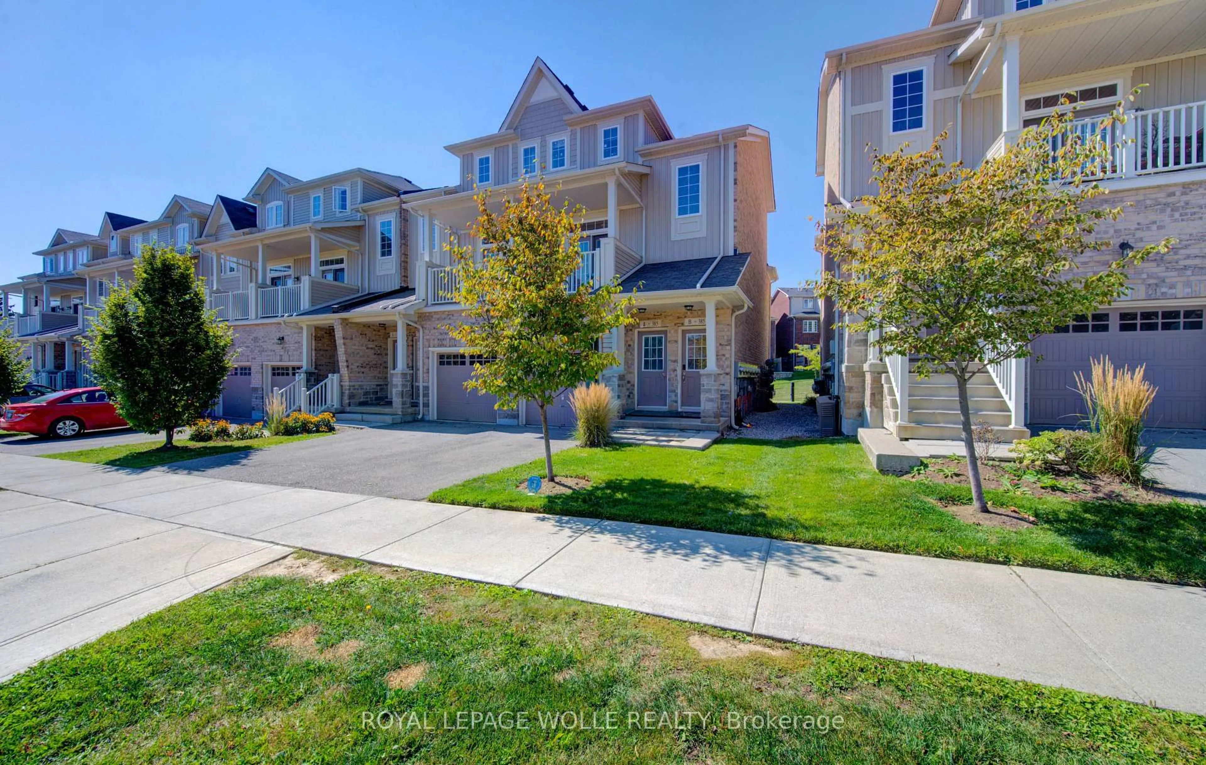A pic from outside/outdoor area/front of a property/back of a property/a pic from drone, street for 385 Westwood Dr #B, Kitchener Ontario N2M 0B5