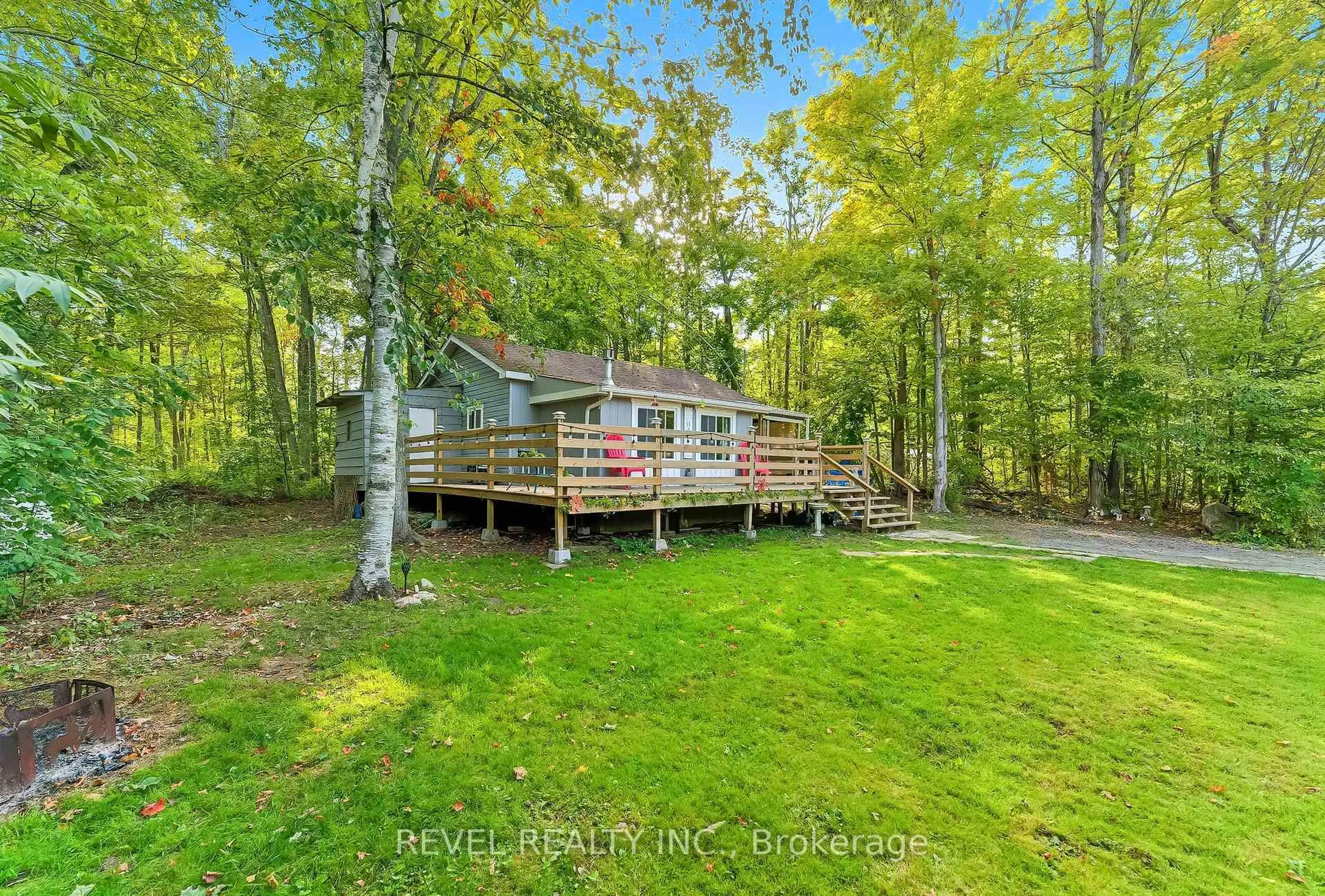 A pic from outside/outdoor area/front of a property/back of a property/a pic from drone, water/lake/river/ocean view for 57 Rollie's Bay Rd, Curve Lake First Nation 35 Ontario K0L 1R0
