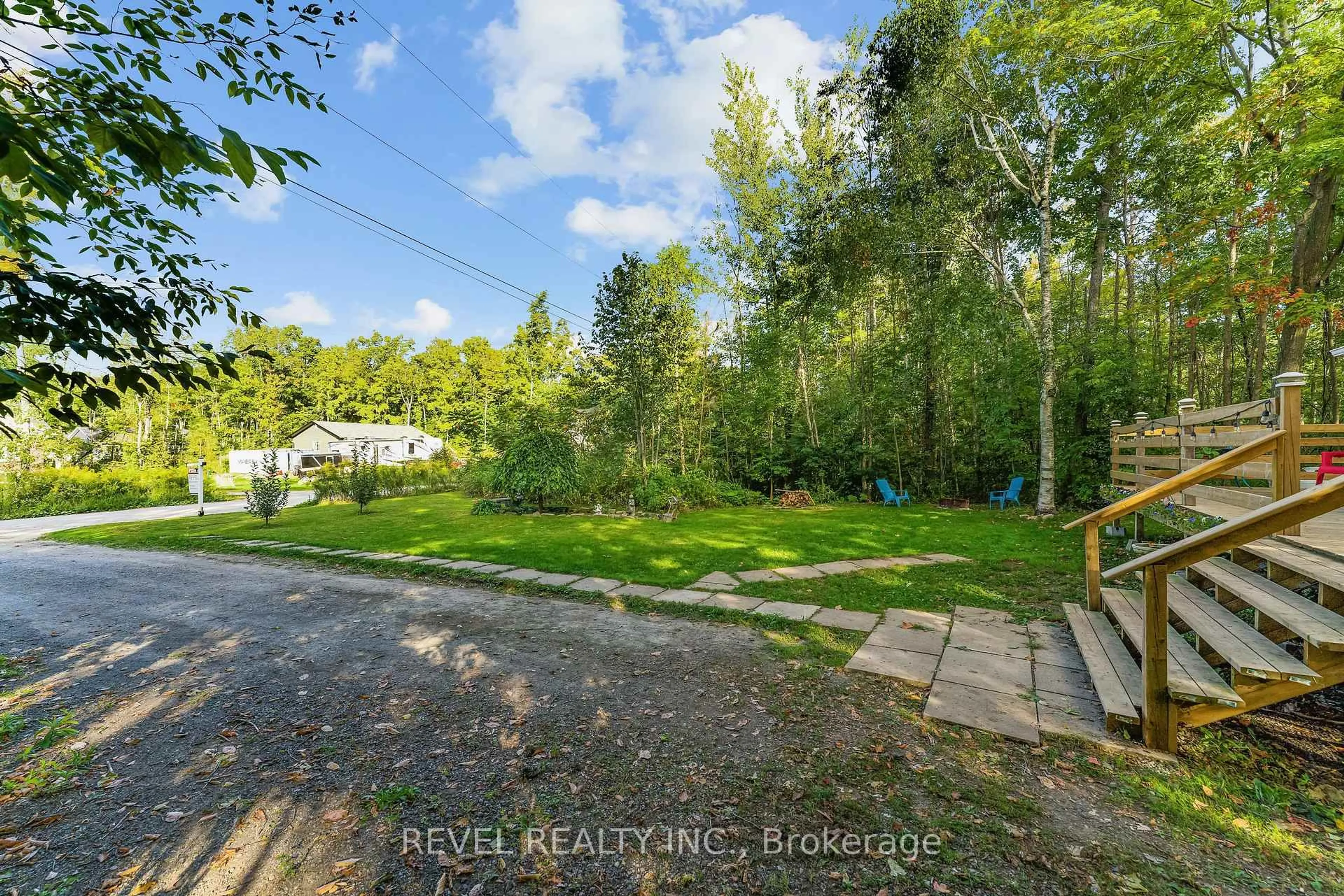 A pic from outside/outdoor area/front of a property/back of a property/a pic from drone, forest/trees view for 57 Rollie's Bay Rd, Curve Lake First Nation 35 Ontario K0L 1R0