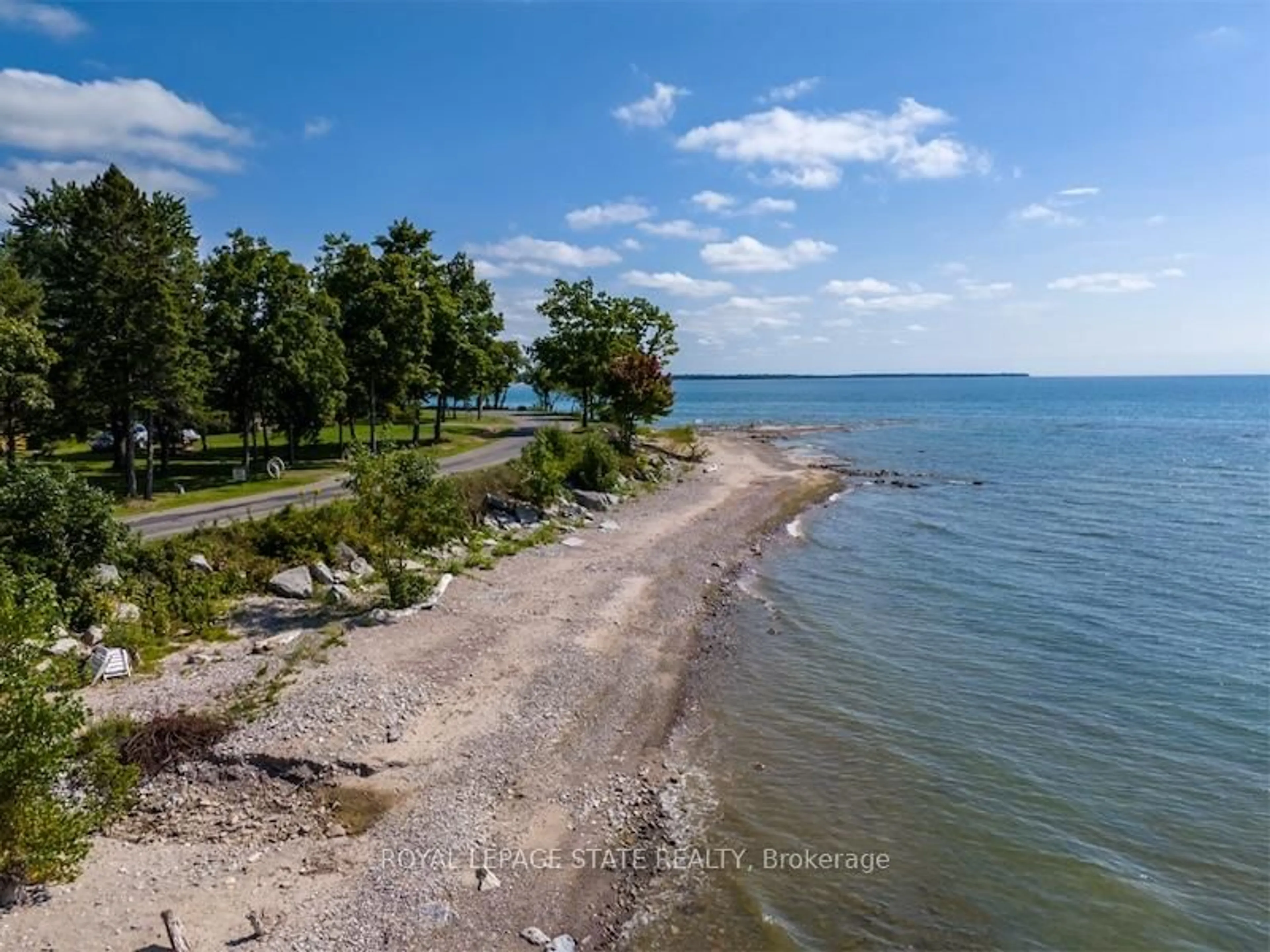 A pic from outside/outdoor area/front of a property/back of a property/a pic from drone, water/lake/river/ocean view for 2431 Lakeshore Rd, Haldimand Ontario N1A 2W8