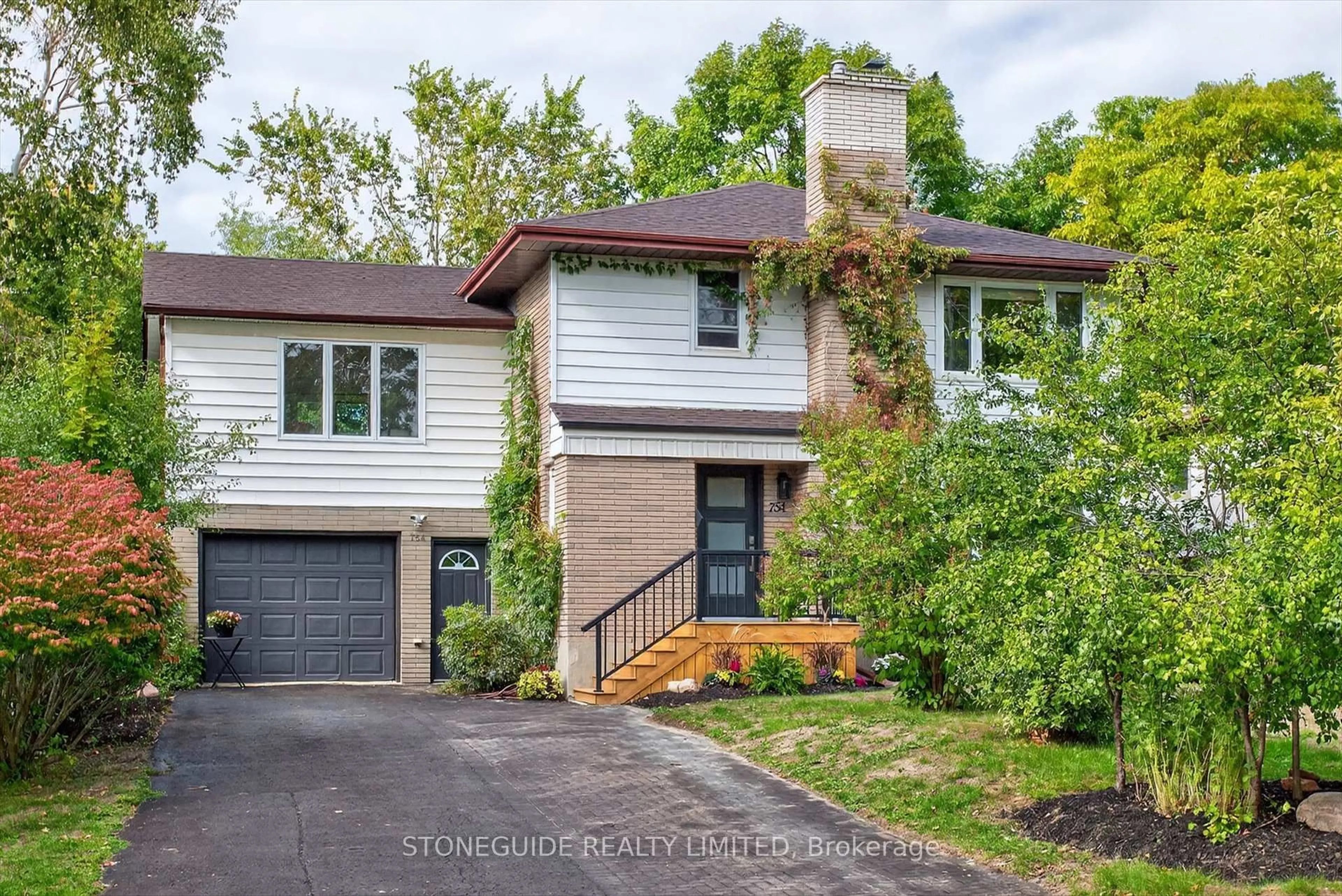 Home with brick exterior material, street for 754 Hopkins Ave, Peterborough Ontario K9J 4Y5