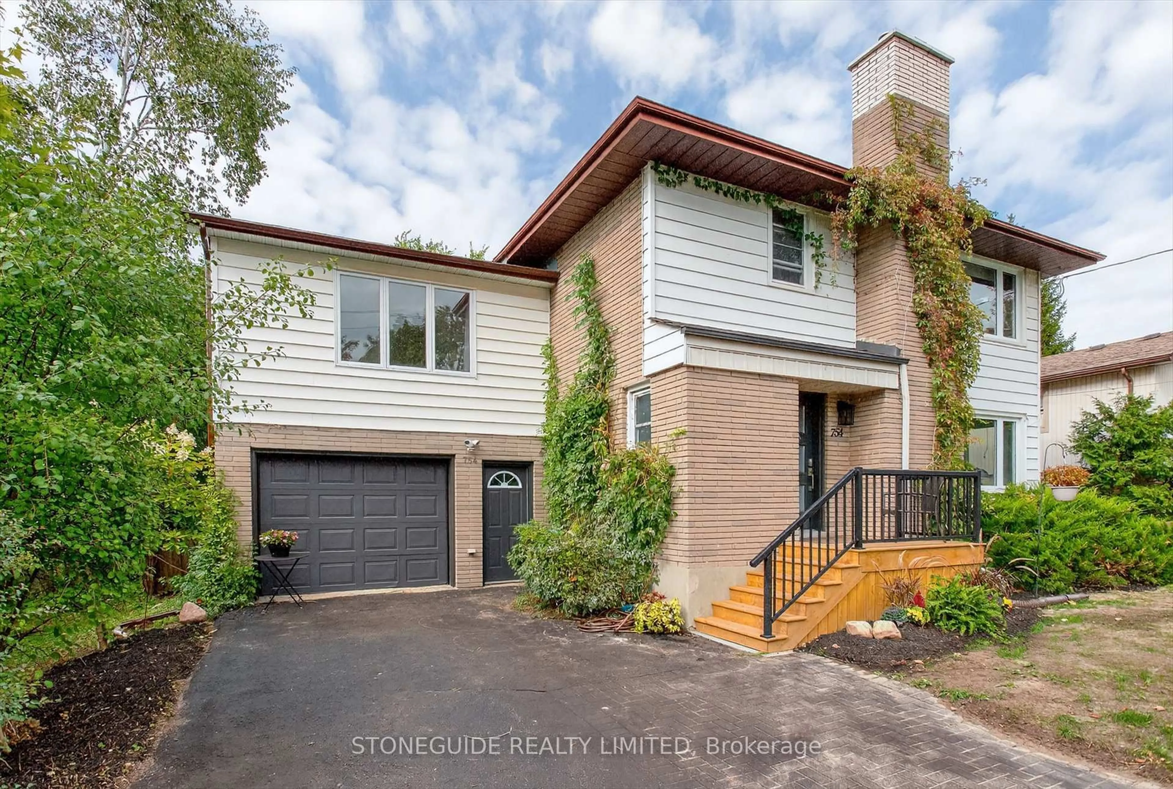 Home with brick exterior material, street for 754 Hopkins Ave, Peterborough Ontario K9J 4Y5