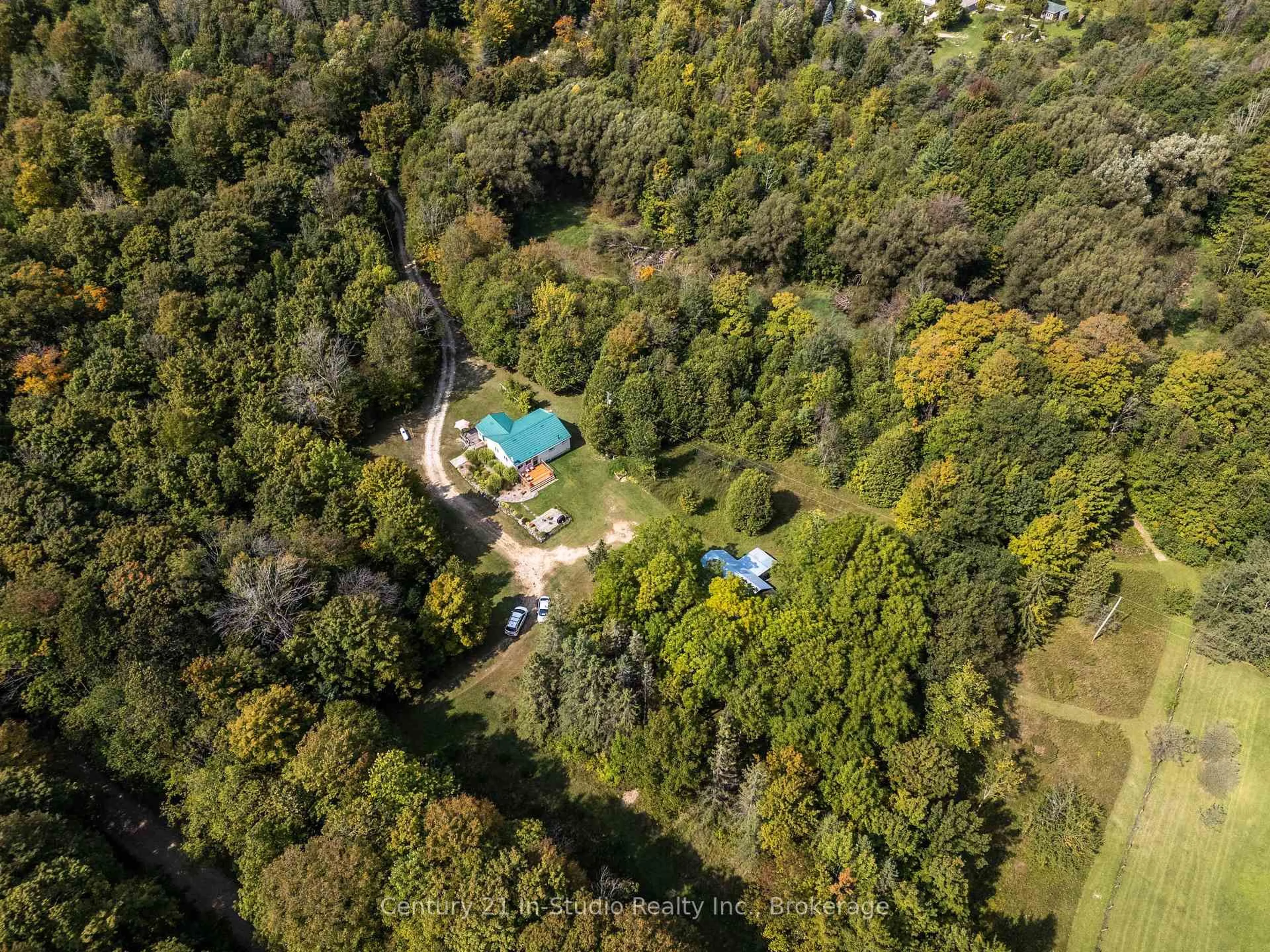 A pic from outside/outdoor area/front of a property/back of a property/a pic from drone, forest/trees view for 473201 Camp Oliver Rd, West Grey Ontario N0C 1K0