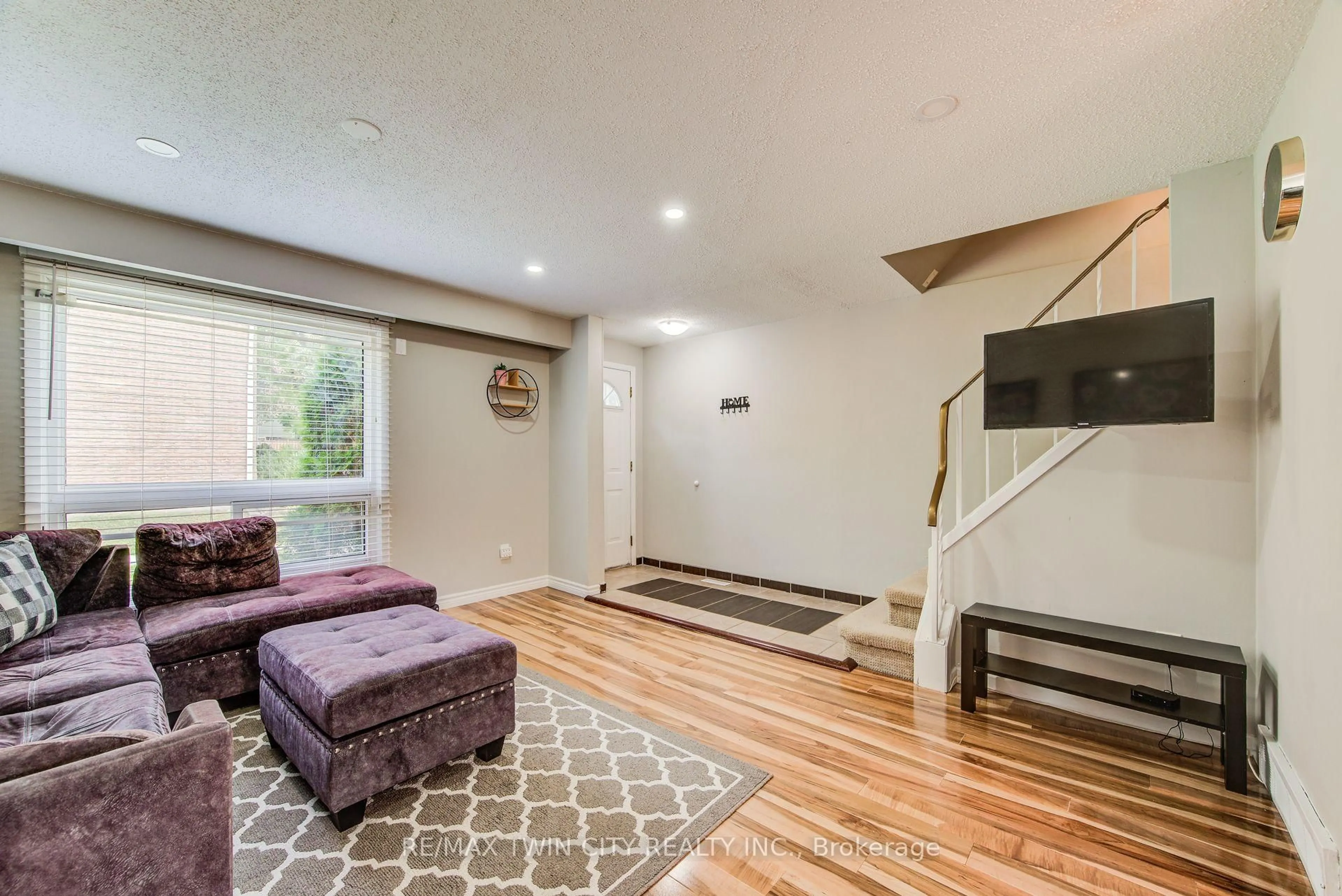 Living room with furniture, unknown for 165 Green Valley Dr #16, Kitchener Ontario N2P 1K3
