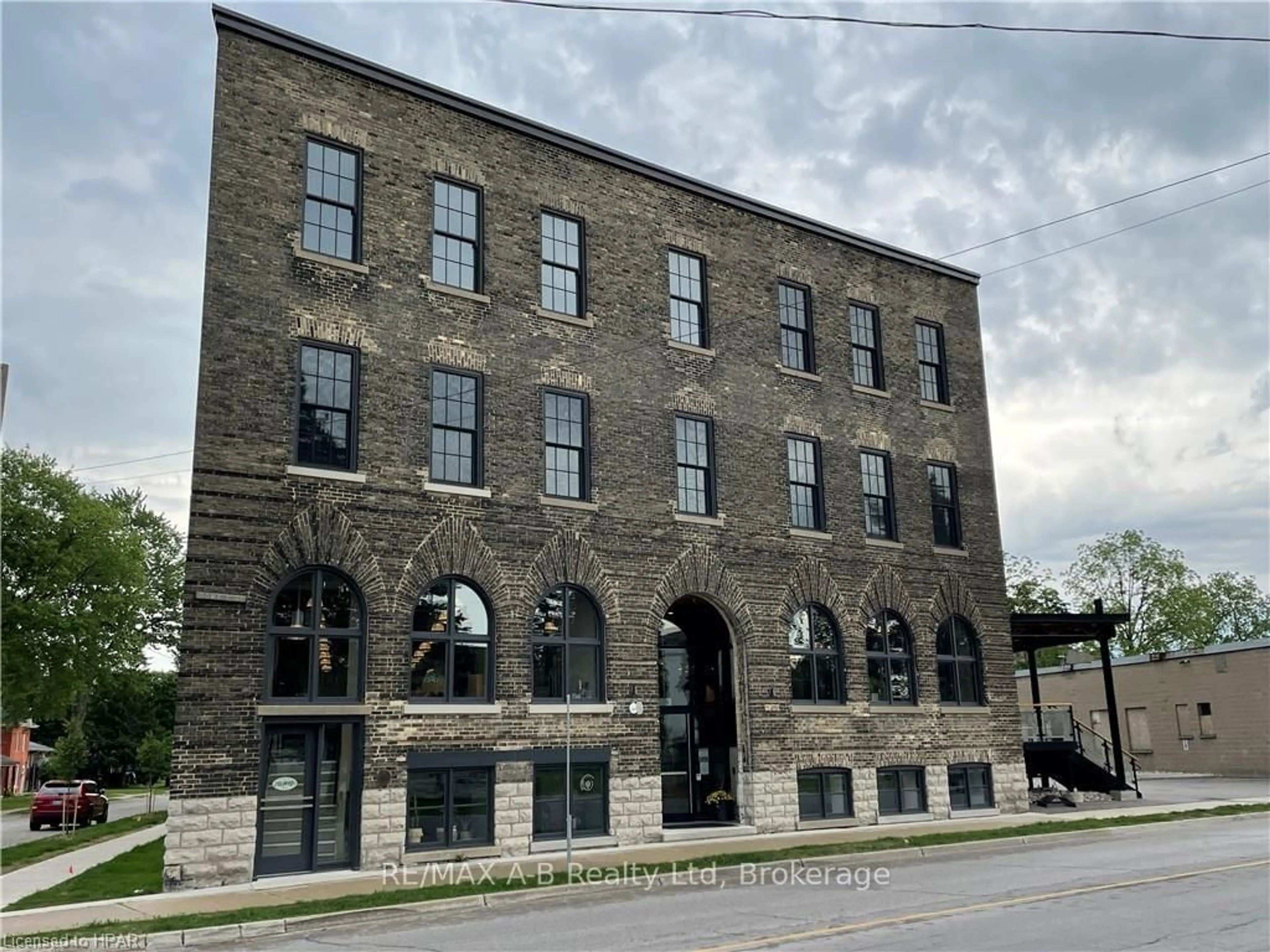Home with brick exterior material, building for 245 Downie St #311, Stratford Ontario N5A 1X2
