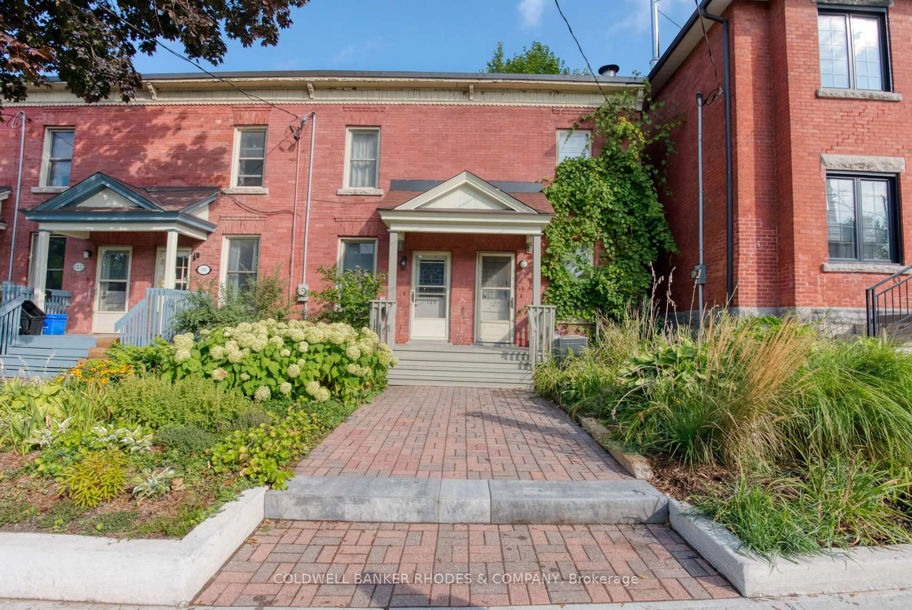 Home with brick exterior material, street for 129 Elm St, Ottawa Ontario K1R 6N4
